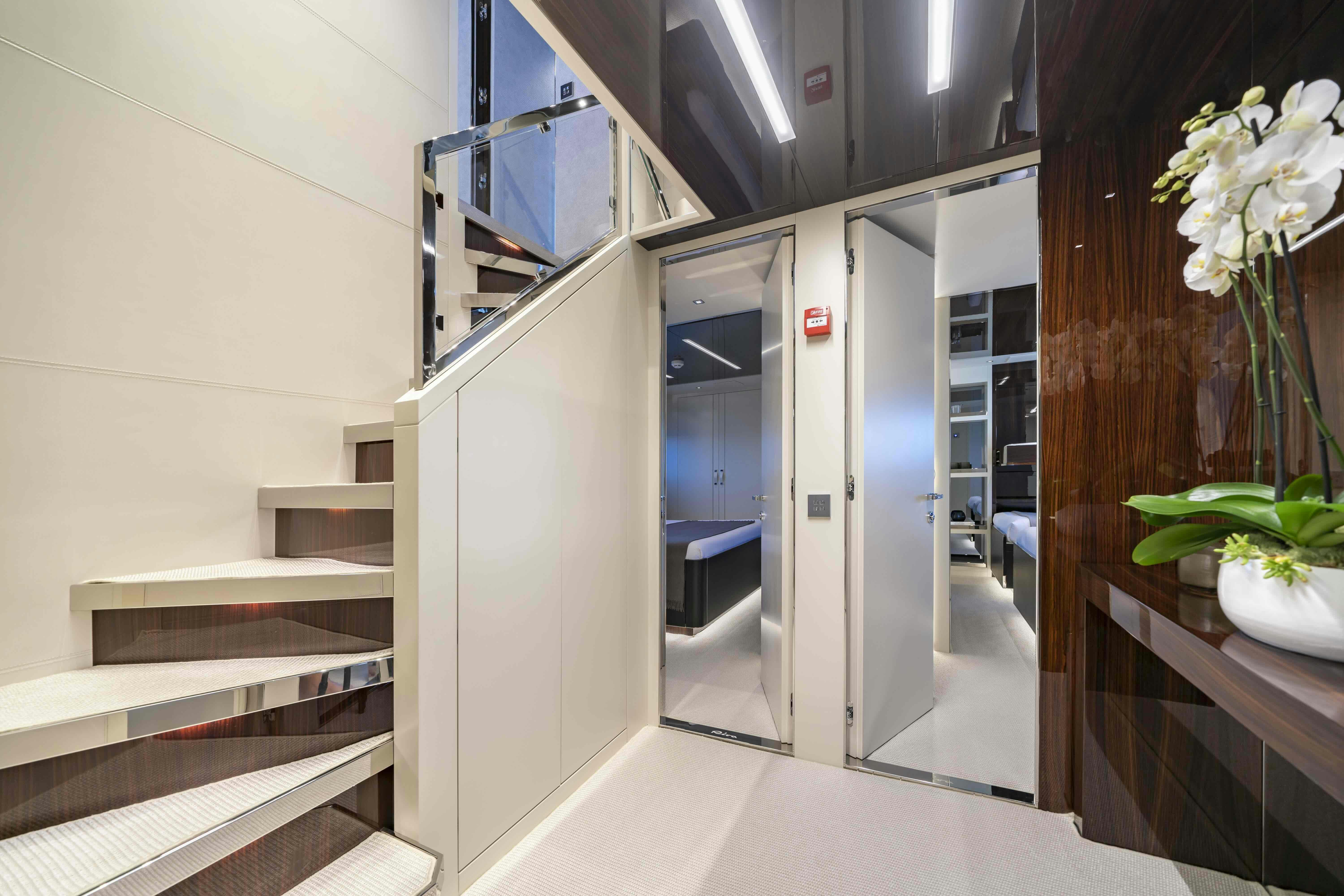 a hallway with white walls aboard ELYSIUM I Yacht for Sale