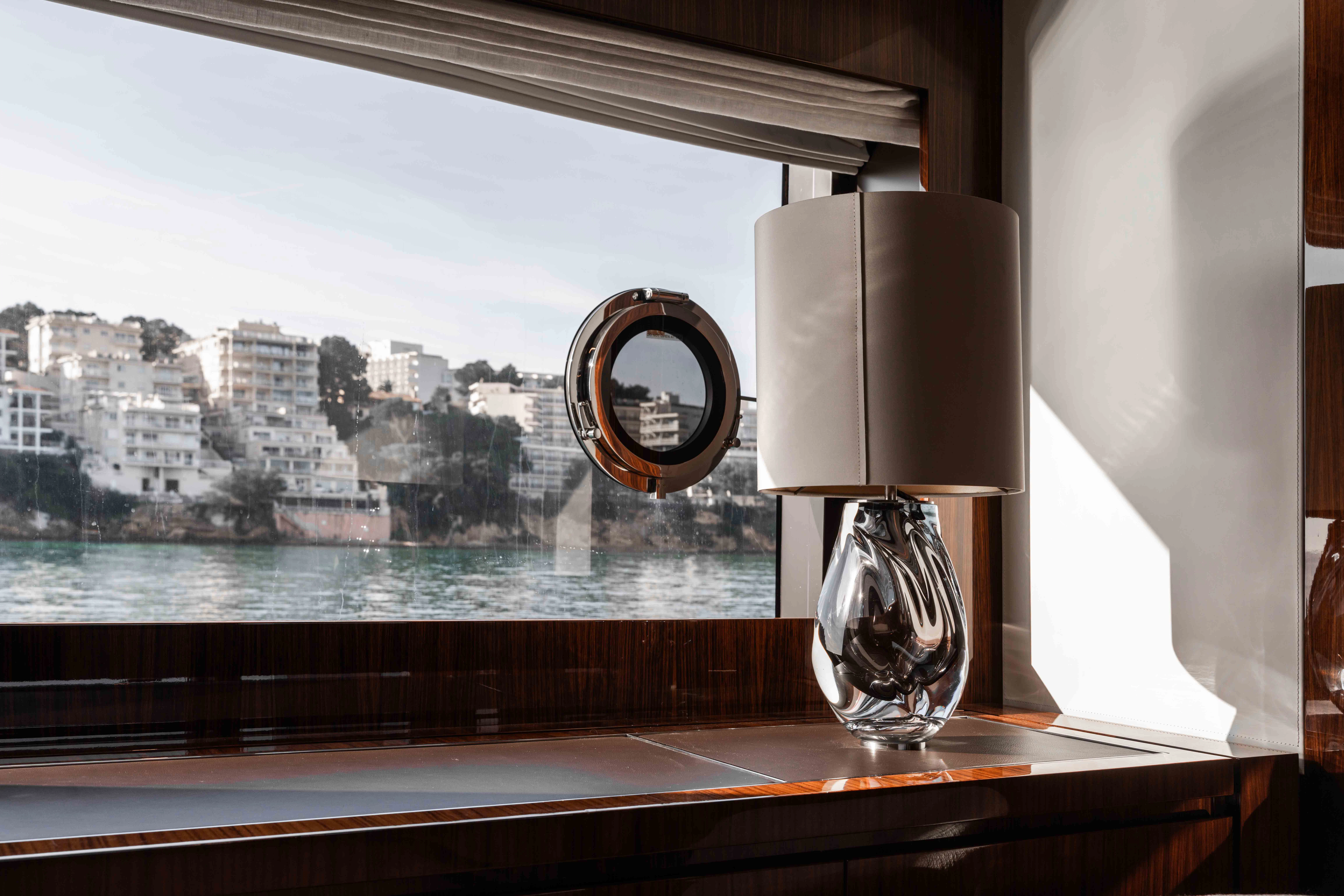 a lamp on a window sill aboard ELYSIUM I Yacht for Sale
