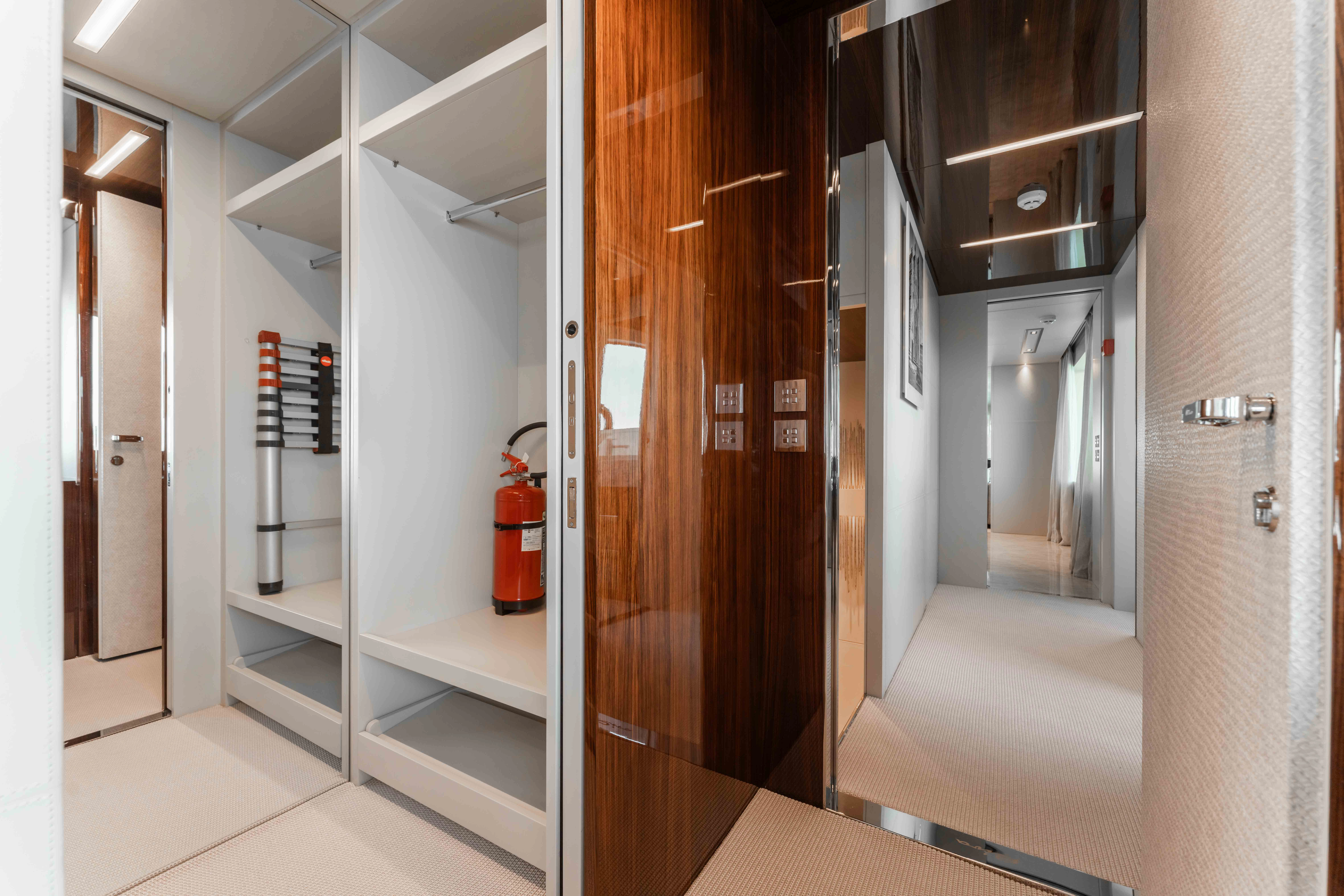 a hallway with doors aboard ELYSIUM I Yacht for Sale