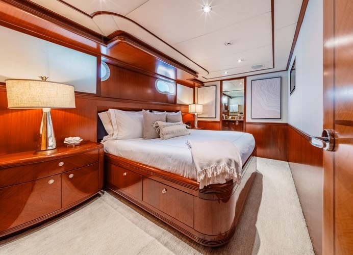 a bed in a room aboard JUST ENOUGH Yacht for Charter