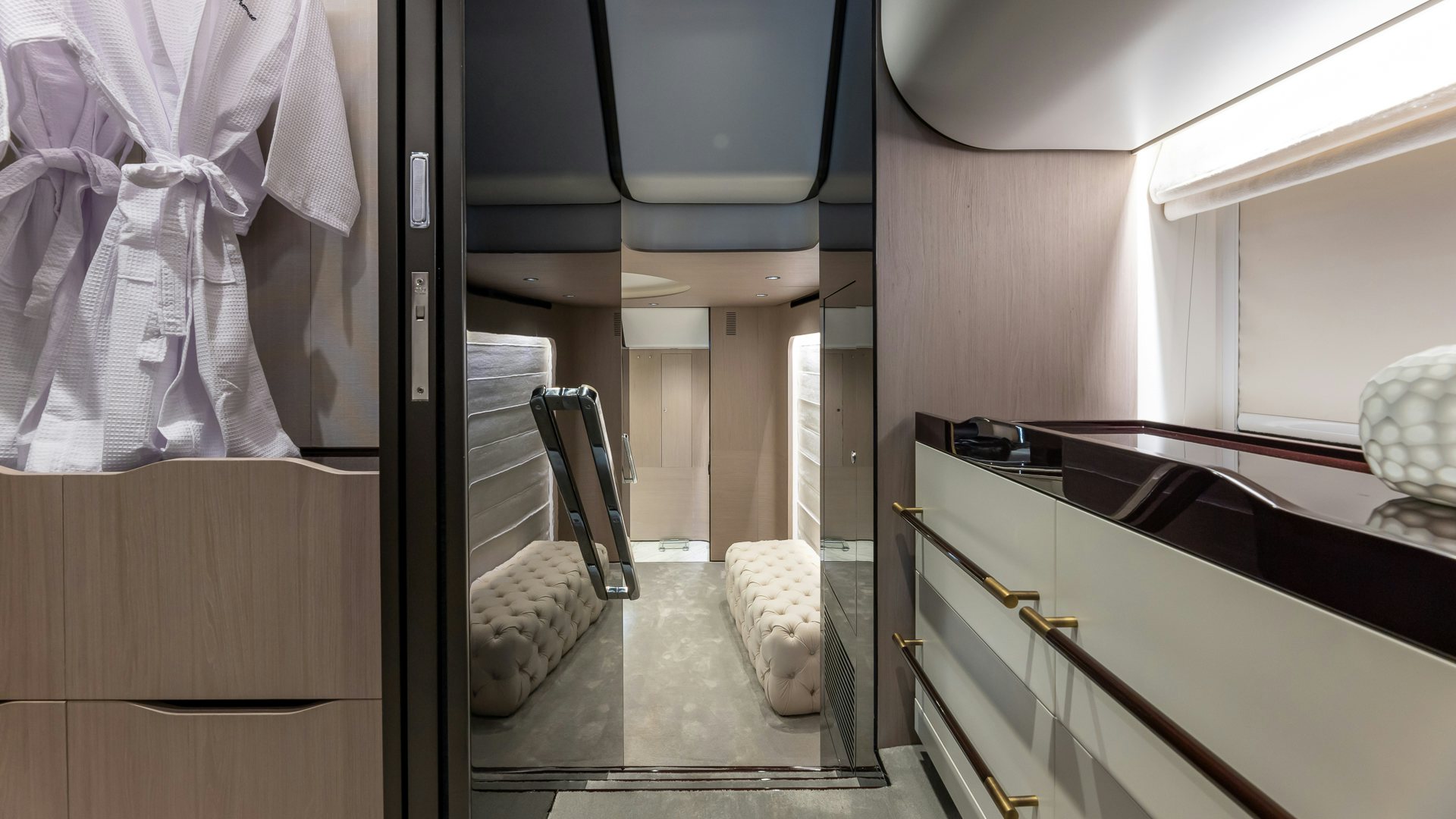 a room with a mirror and a bed aboard PIER PRESSURE Yacht for Charter