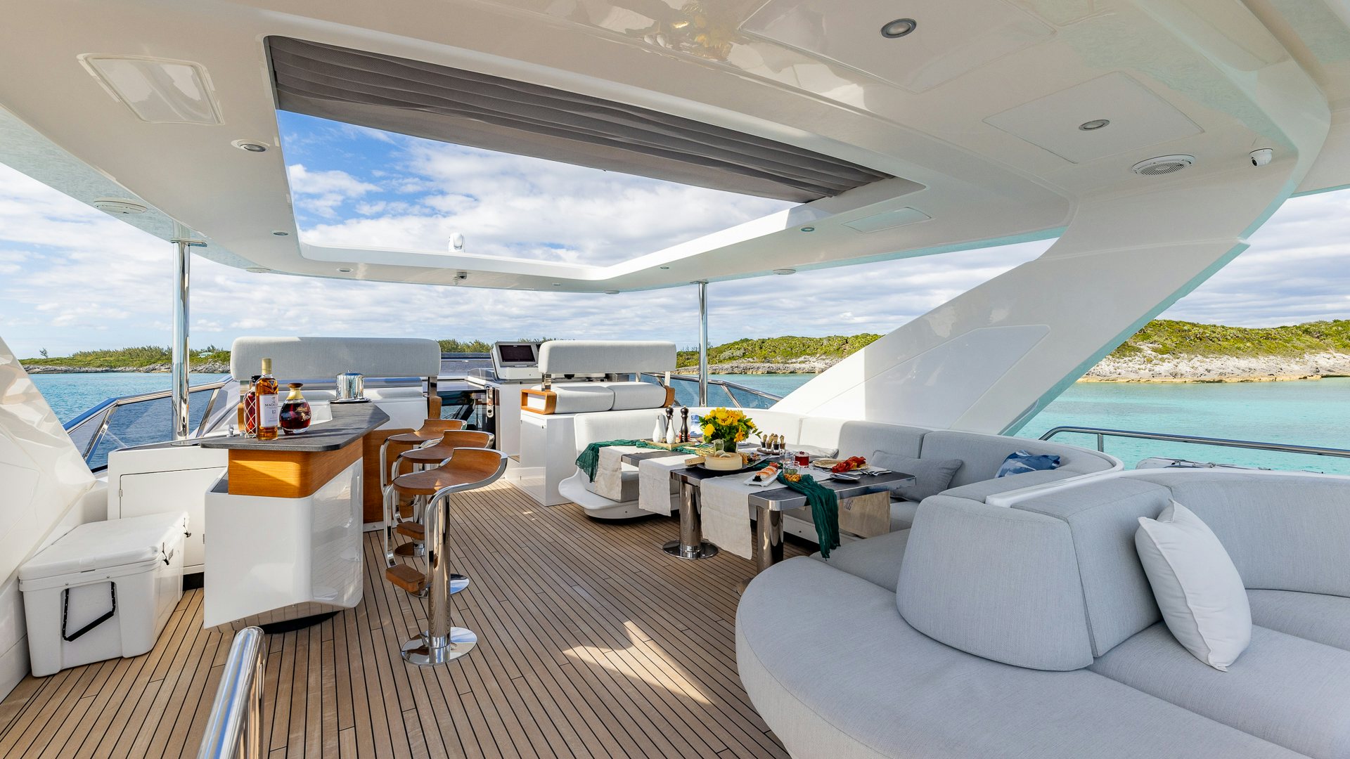 a room with a large window and a view of the ocean aboard PIER PRESSURE Yacht for Charter