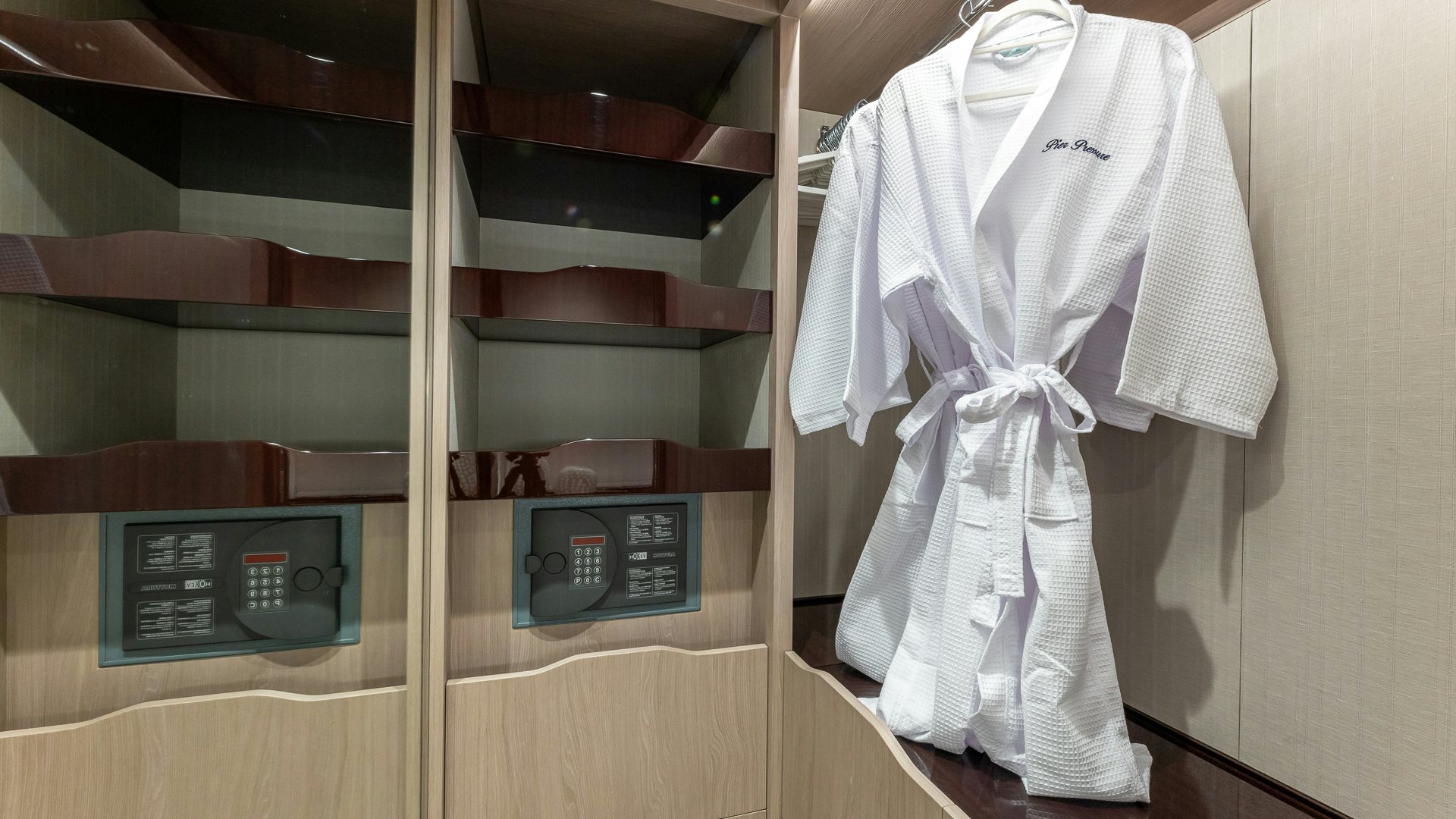 a white robe with a bow aboard PIER PRESSURE Yacht for Charter