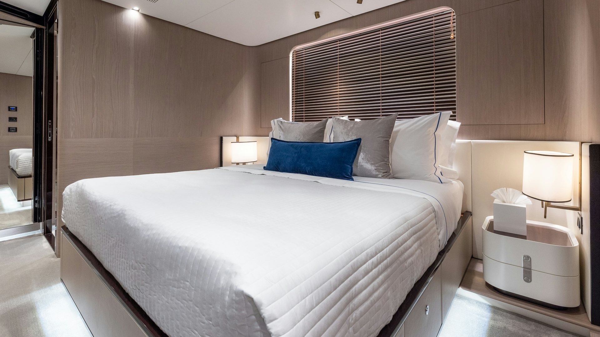 a bed with white sheets aboard PIER PRESSURE Yacht for Charter