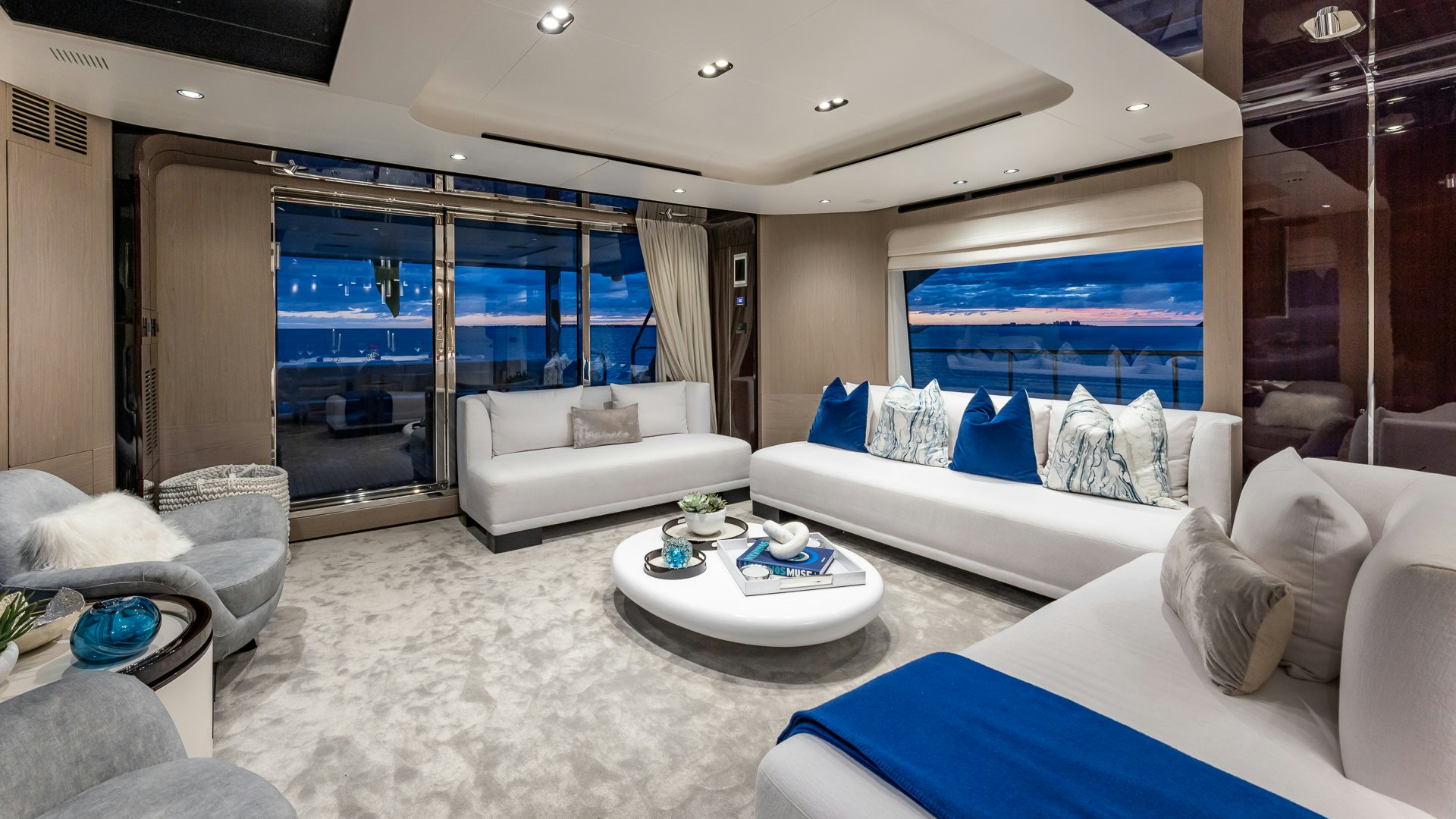 a room with a large window and a view of the ocean aboard PIER PRESSURE Yacht for Charter