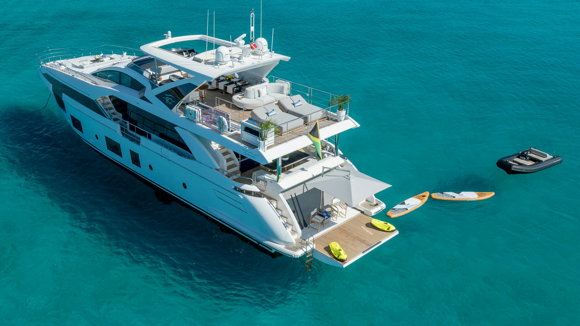 a large white ship in the water aboard PIER PRESSURE Yacht for Charter