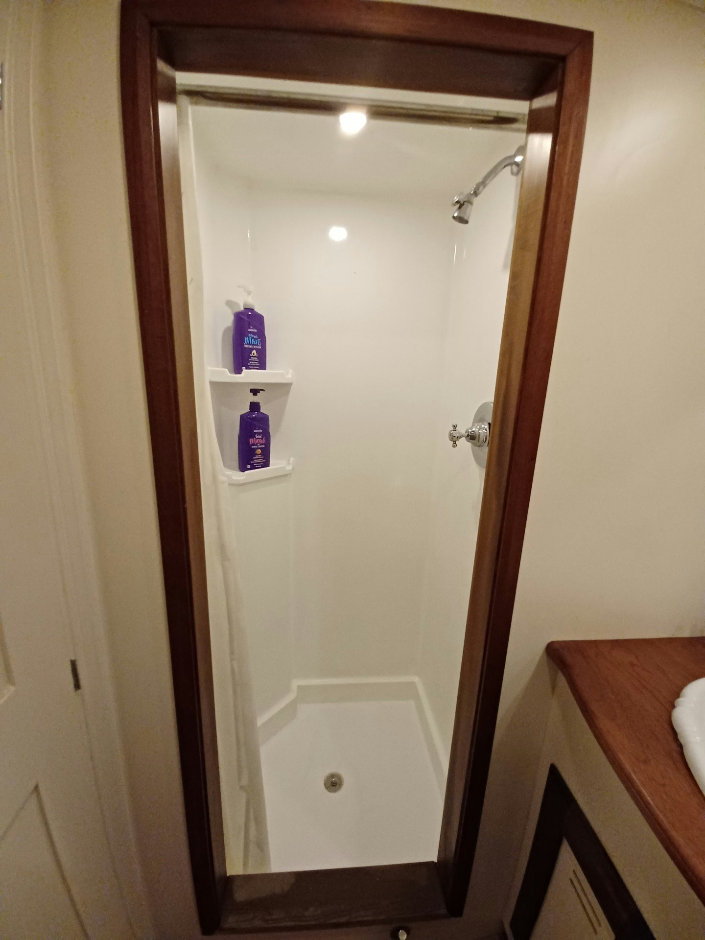 a door with a glass window aboard TARA Yacht for Sale