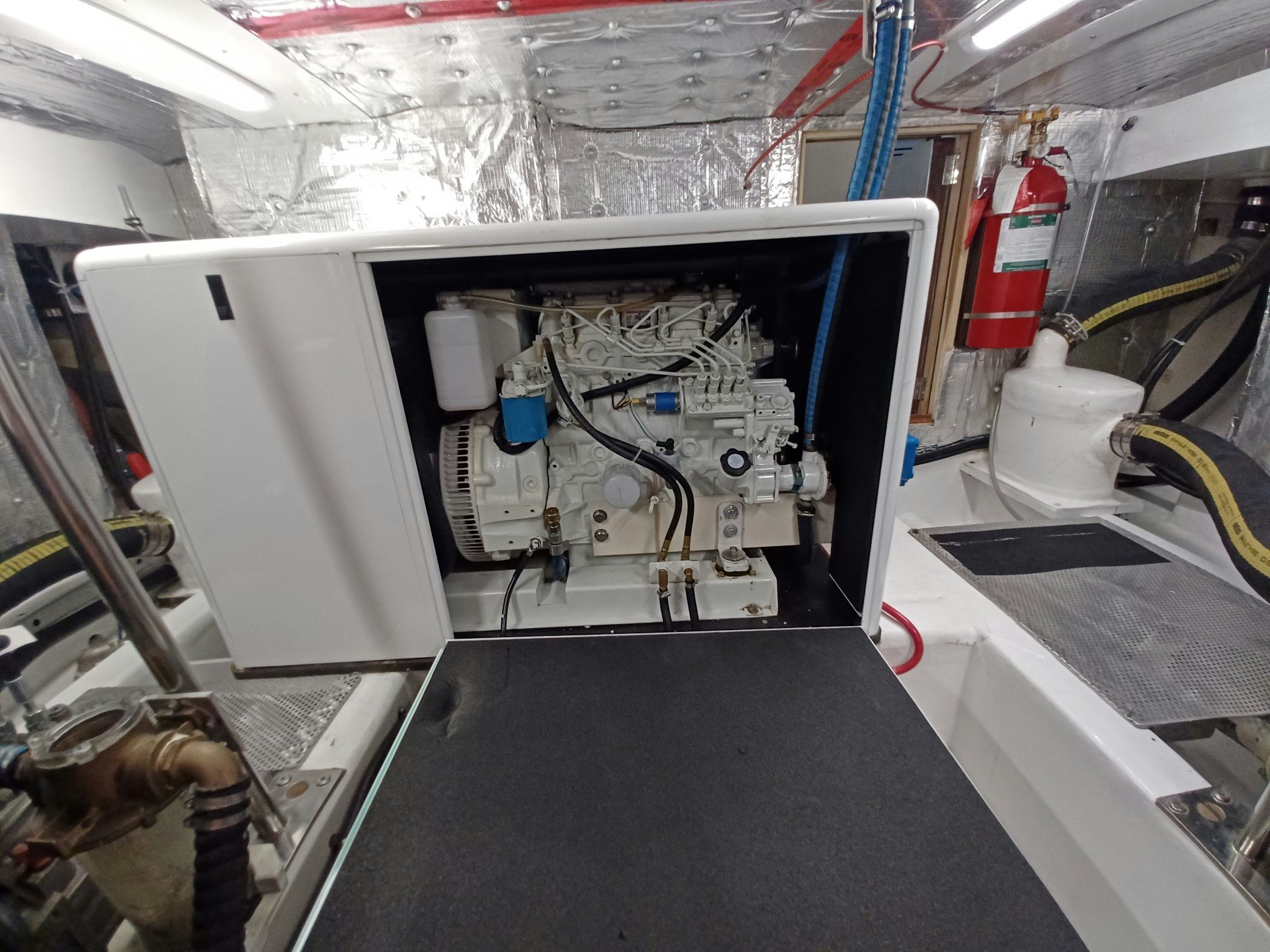 a machine with a large piece of equipment in it aboard TARA Yacht for Sale