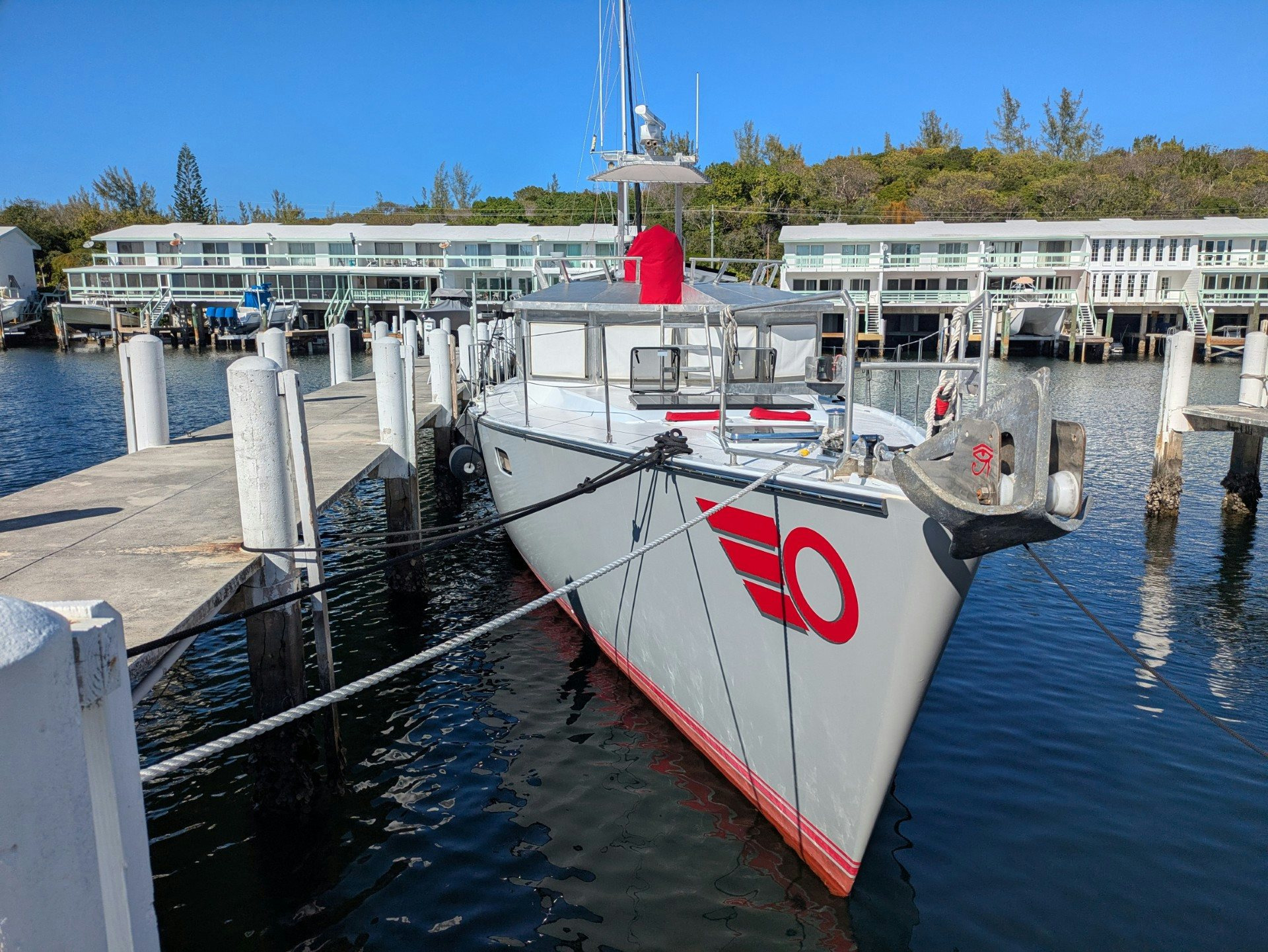 a boat tied to a dock aboard TARA Yacht for Sale