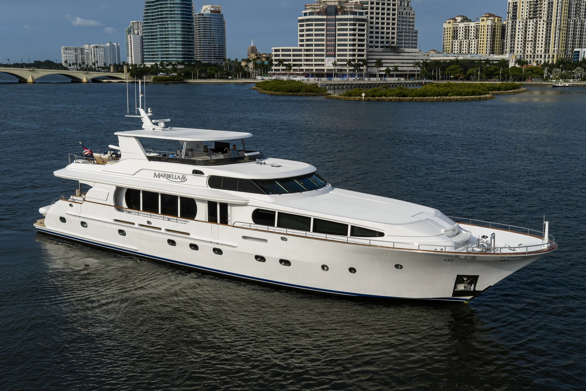 a white yacht on the water aboard MARBELLA IV Yacht for Sale