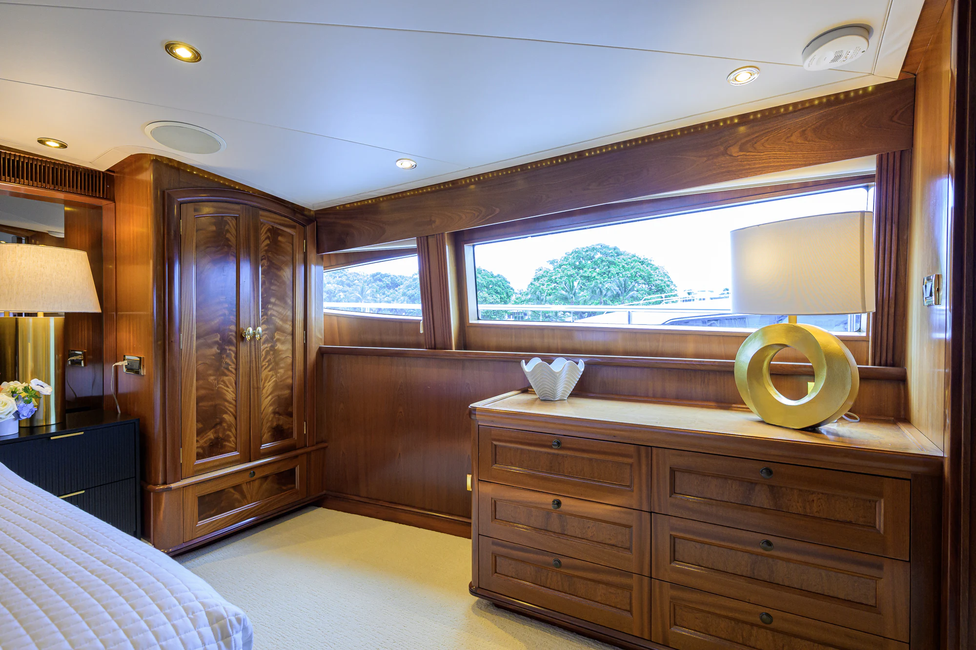a room with a dresser and a mirror aboard MARBELLA IV Yacht for Sale