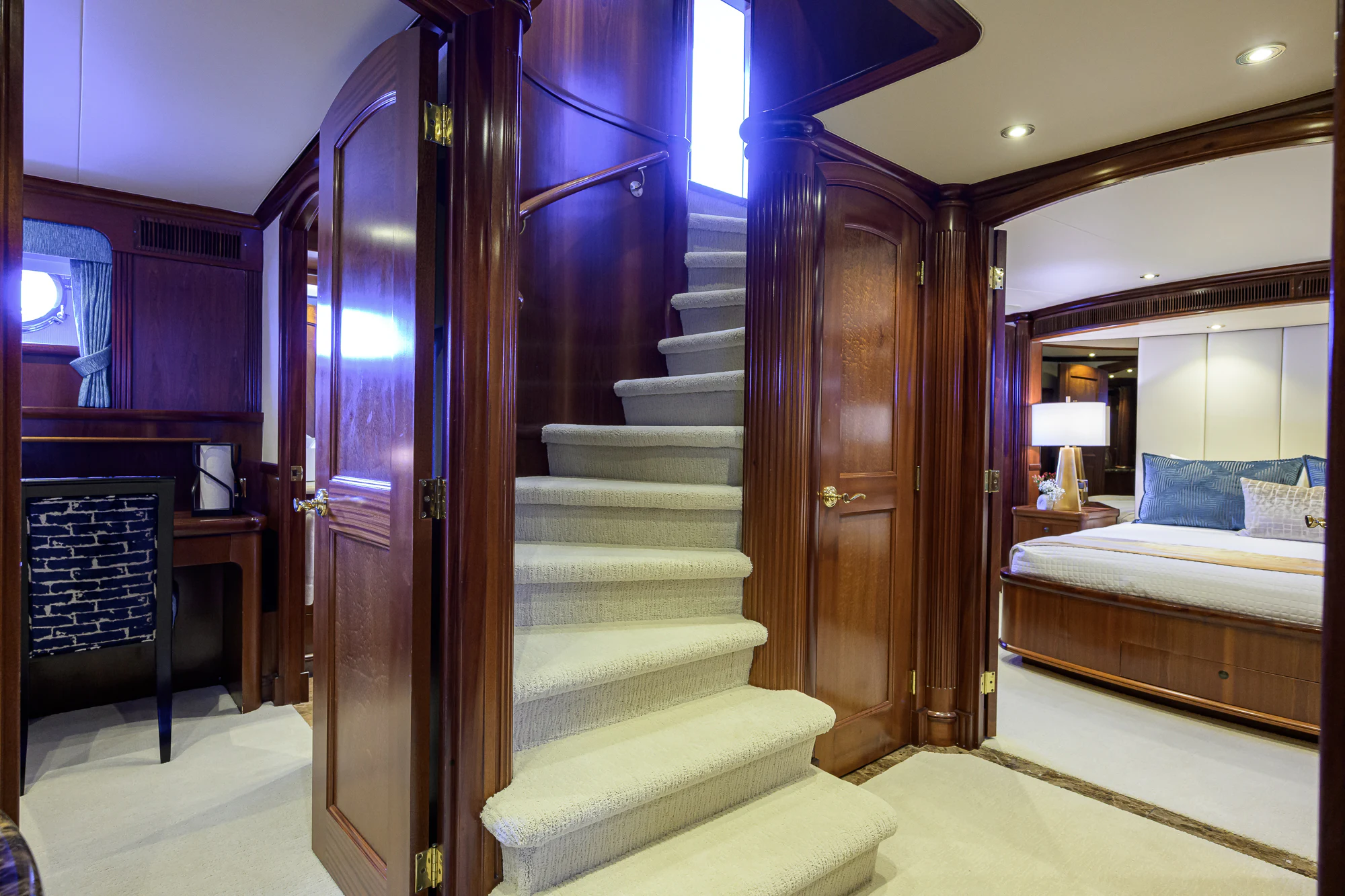 a bed and a closet in a room aboard MARBELLA IV Yacht for Sale