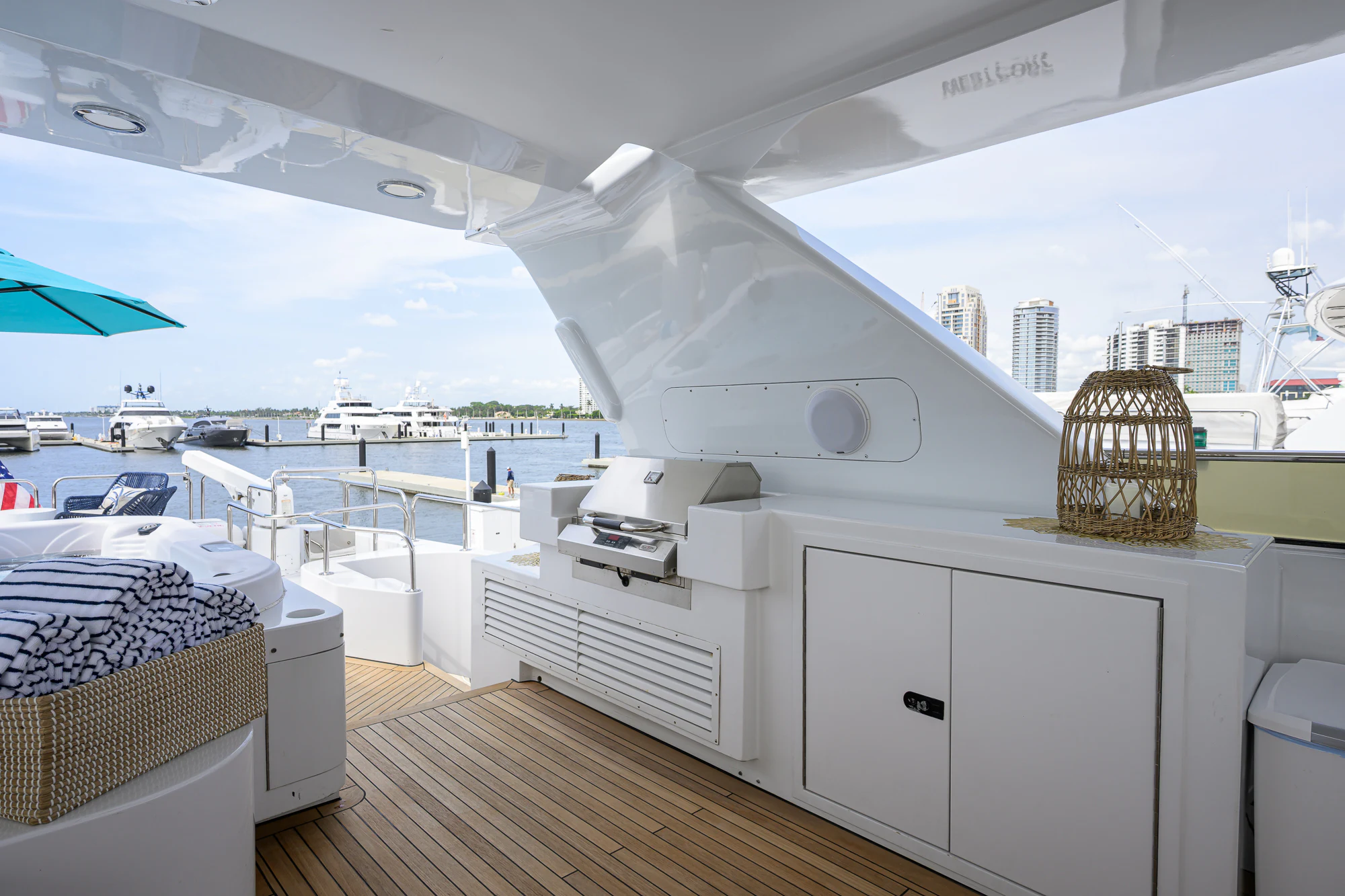 a boat dock with a large ship in the background aboard MARBELLA IV Yacht for Sale
