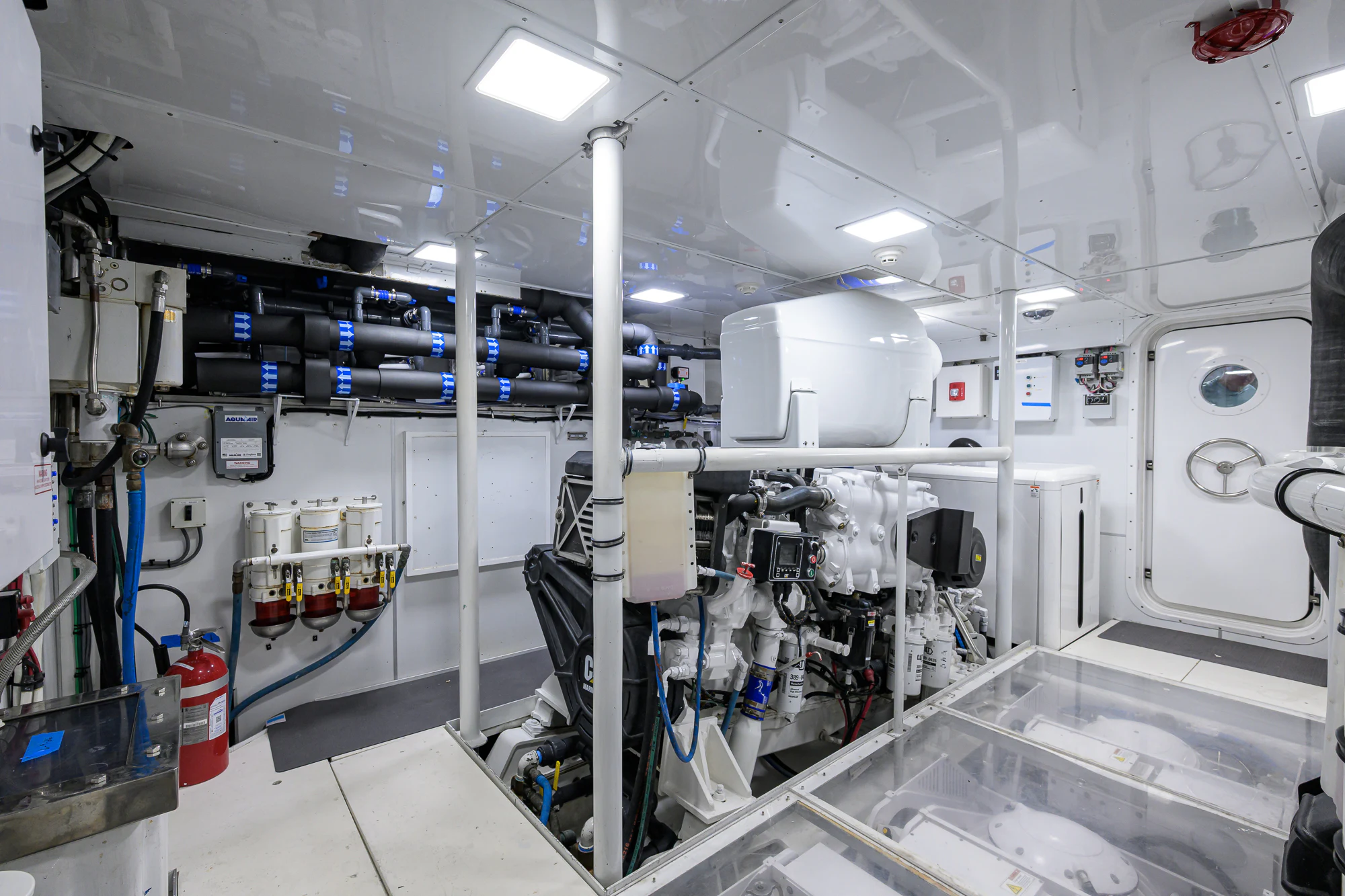 a room with machinery aboard MARBELLA IV Yacht for Sale