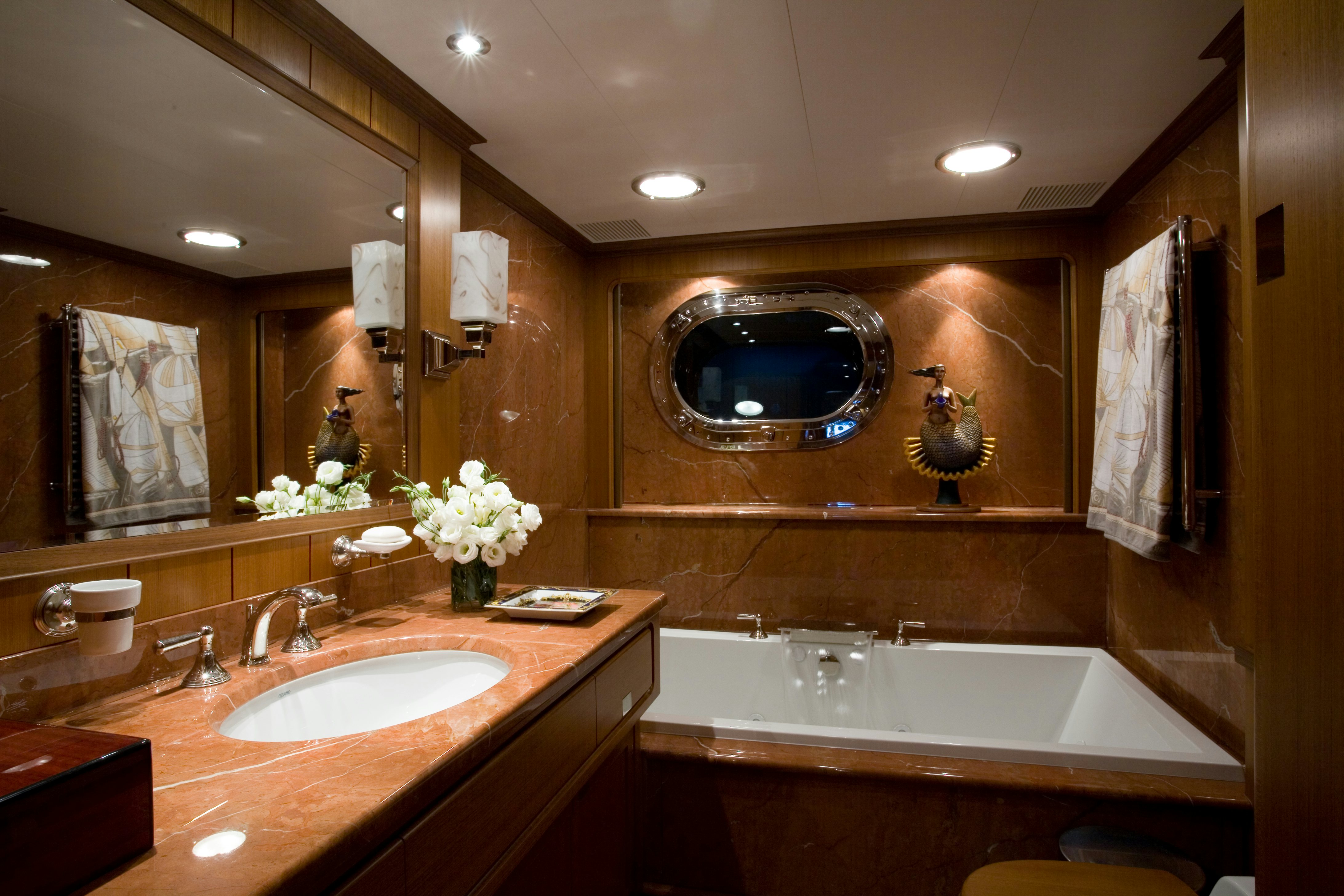 a bathroom with a large mirror aboard TAMSEN Yacht for Sale
