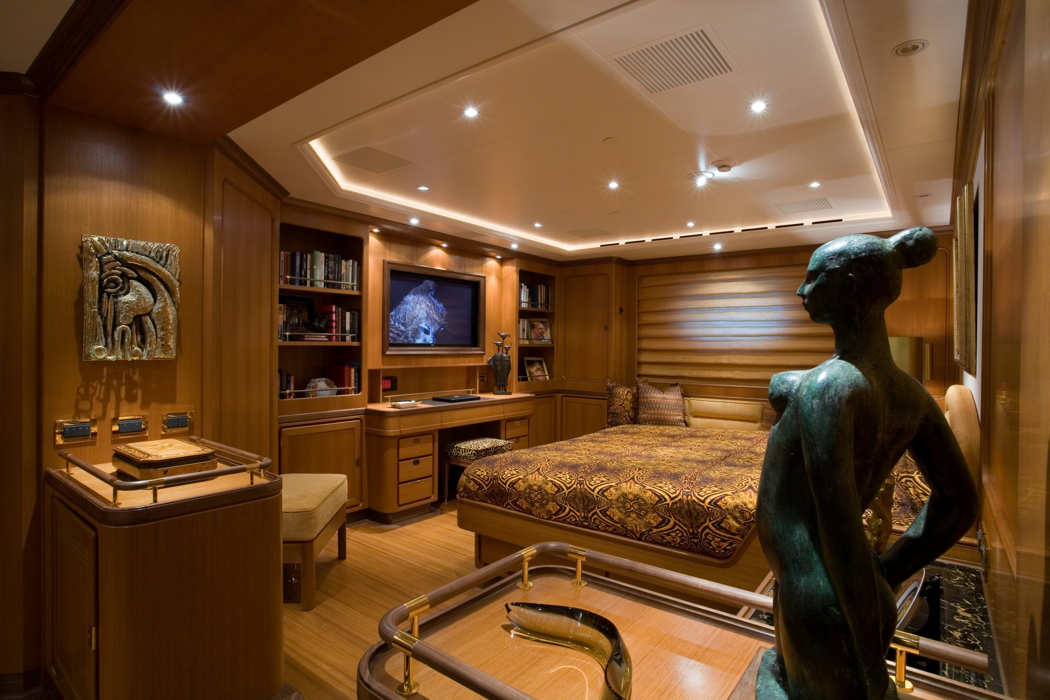 a room with a tv and a couch aboard TAMSEN Yacht for Sale