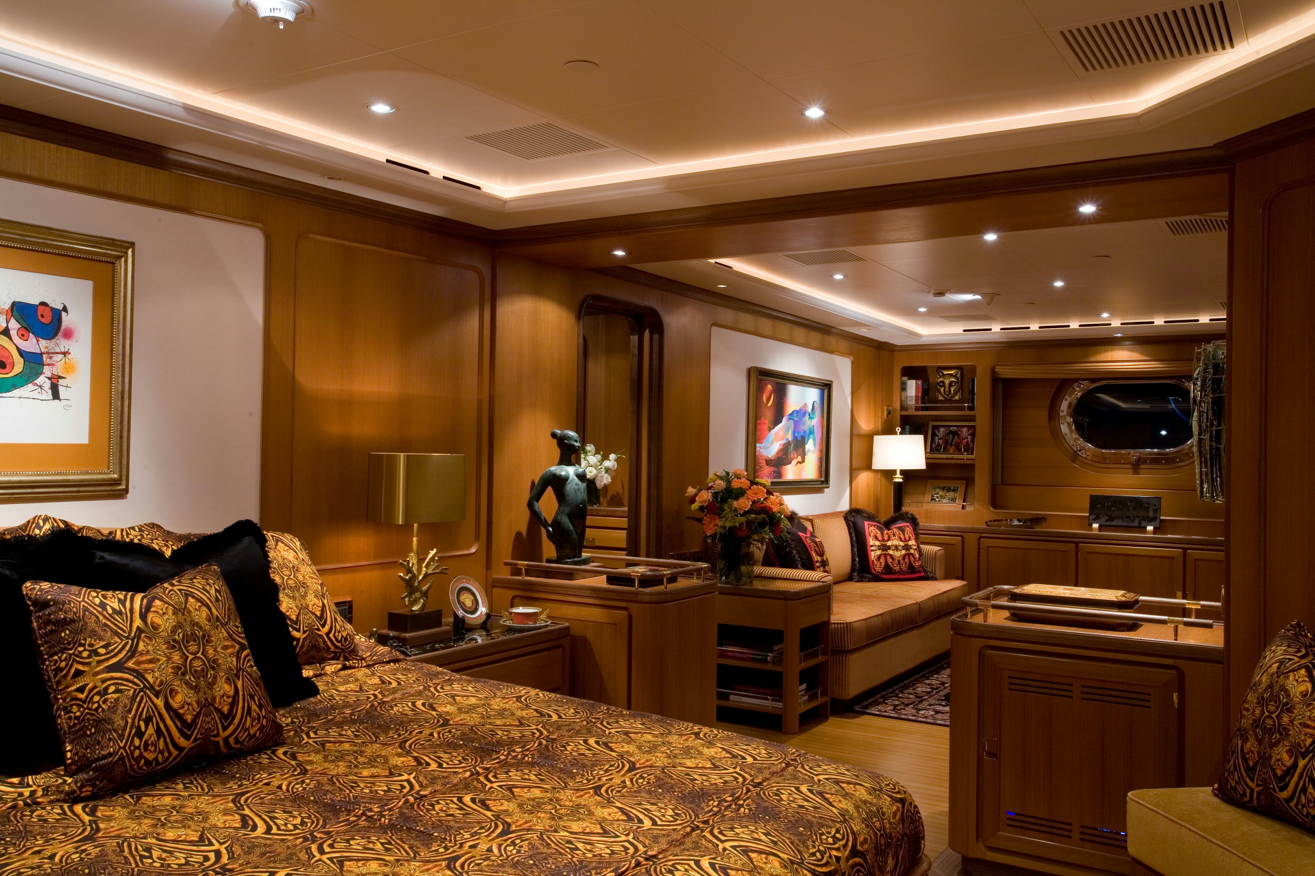 a living room with a large mirror aboard TAMSEN Yacht for Sale