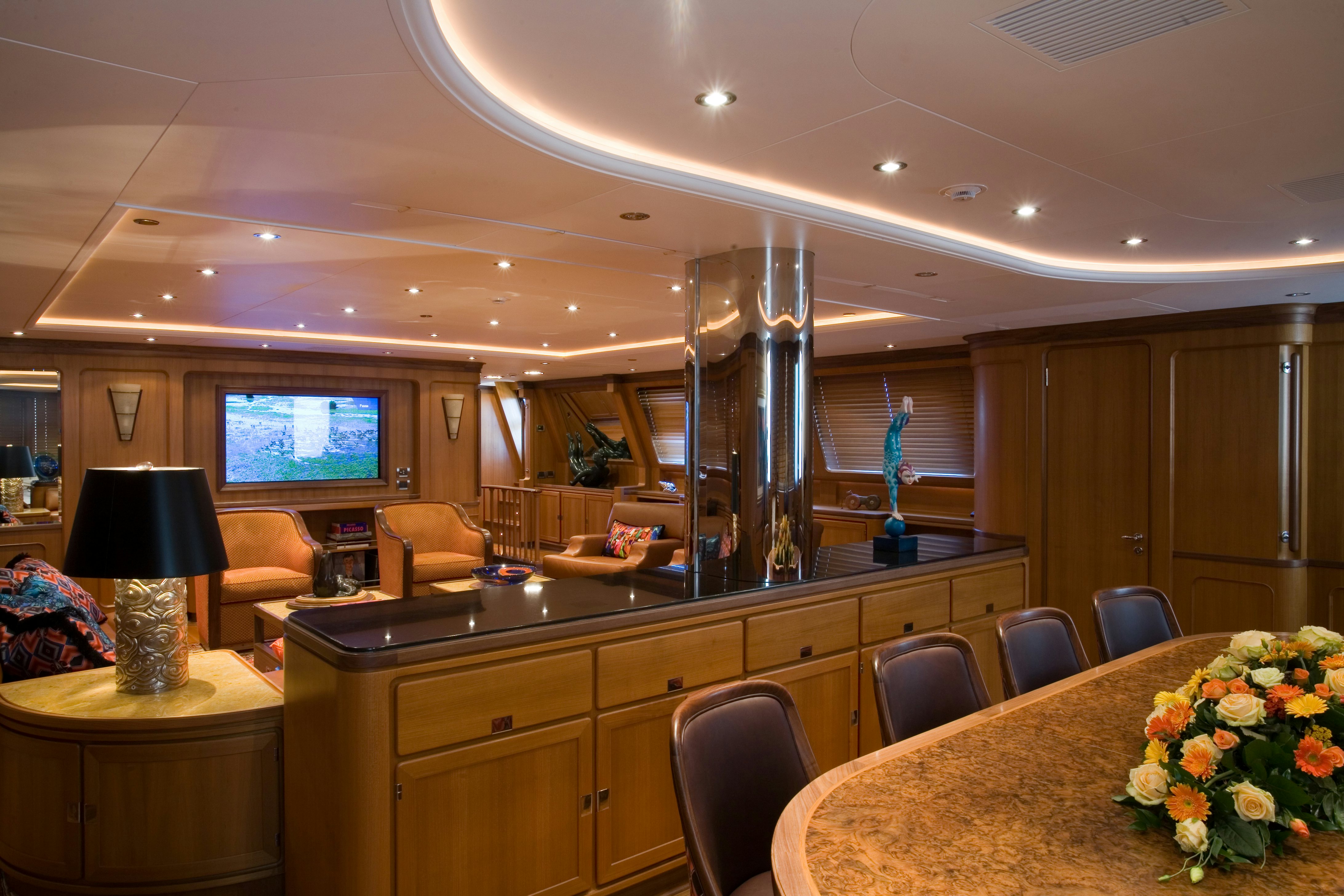 a room with a table and chairs aboard TAMSEN Yacht for Sale