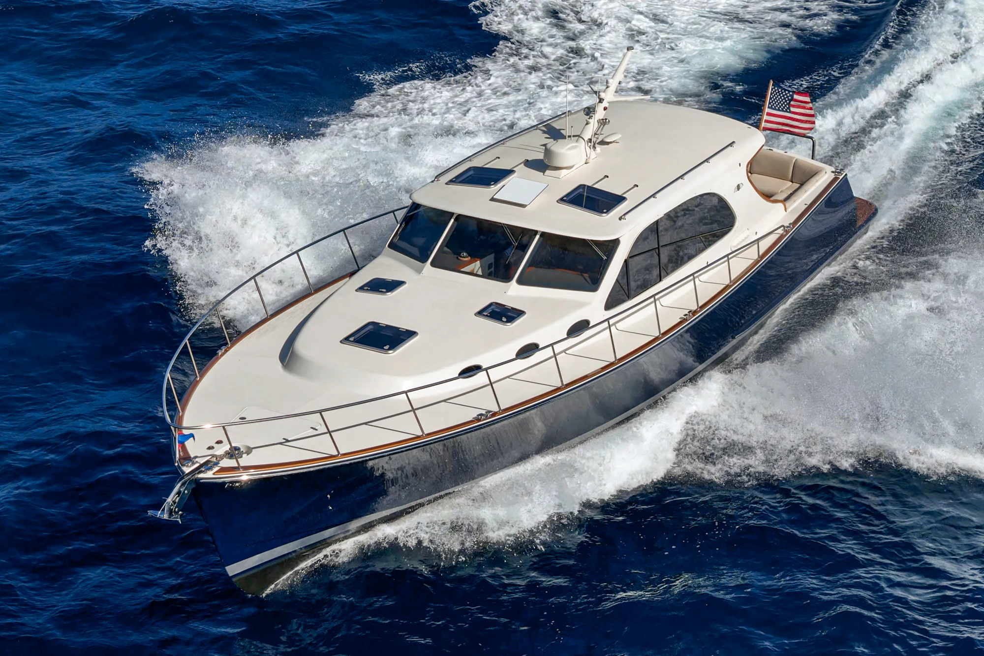 a white yacht on the water aboard PIPE DREAM Yacht for Sale