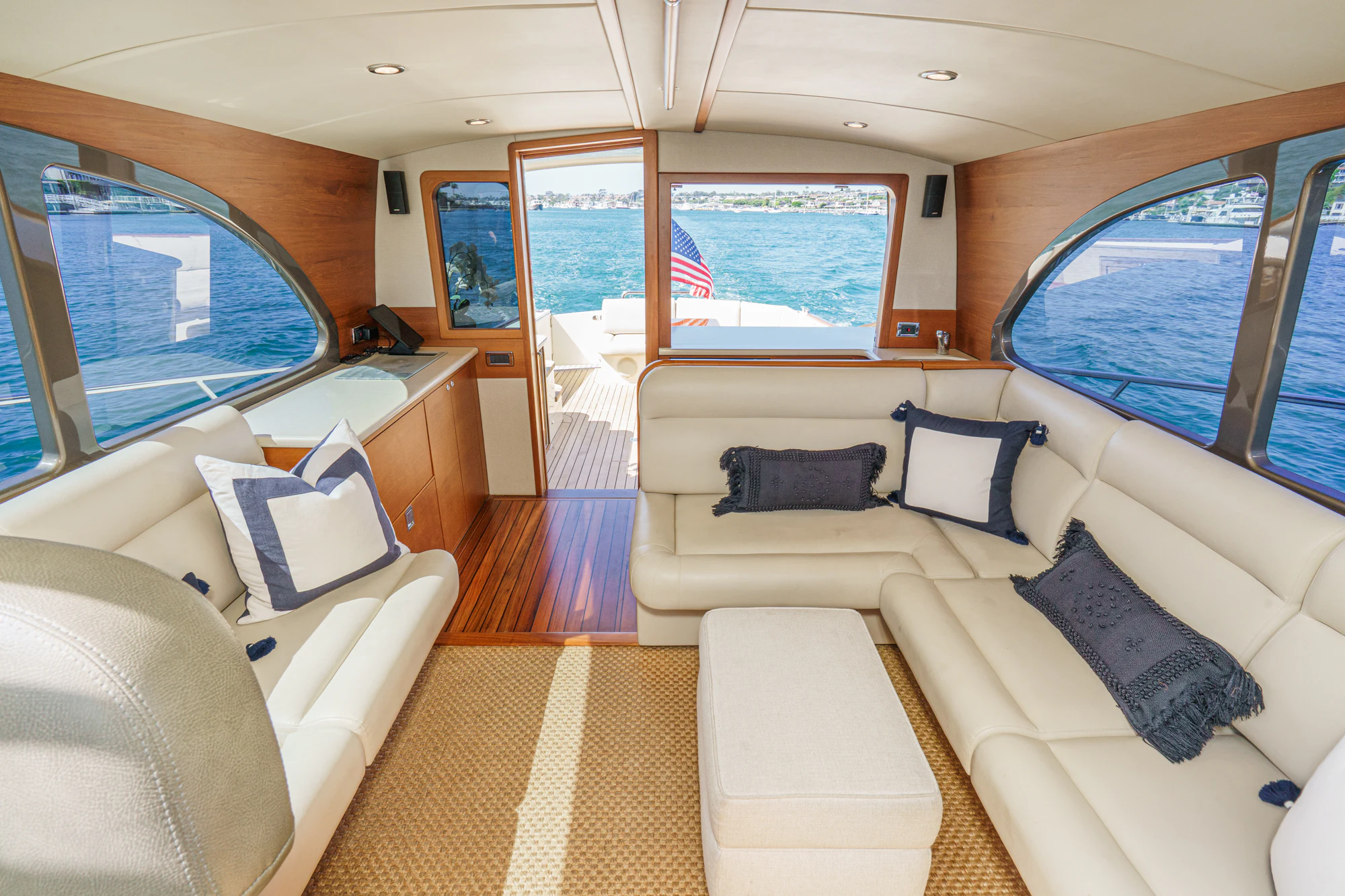 a large living room with a large window aboard PIPE DREAM Yacht for Sale