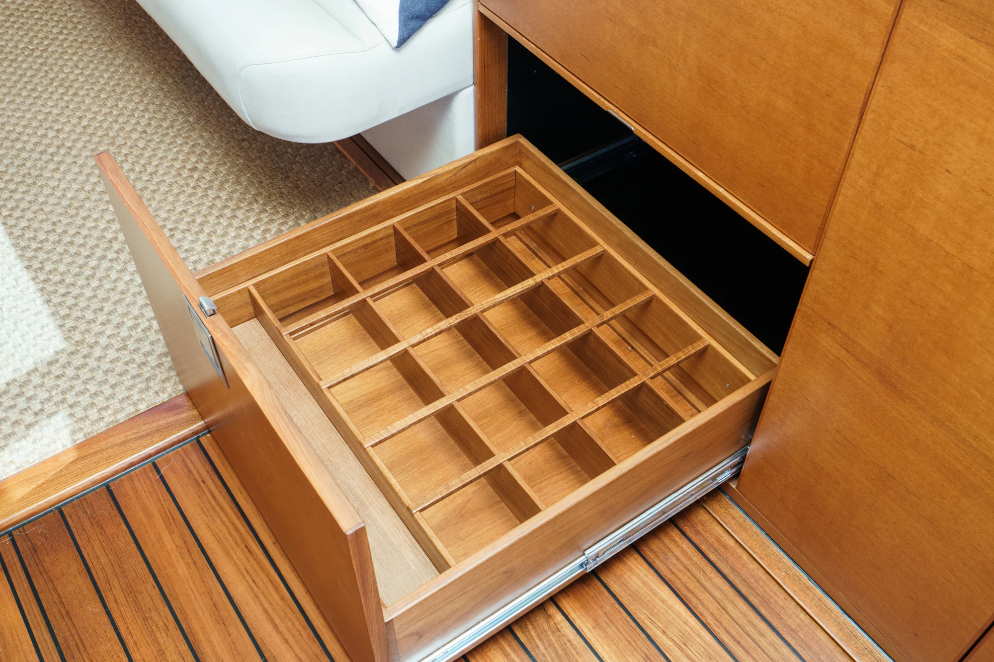 a wooden staircase with a white railing aboard PIPE DREAM Yacht for Sale