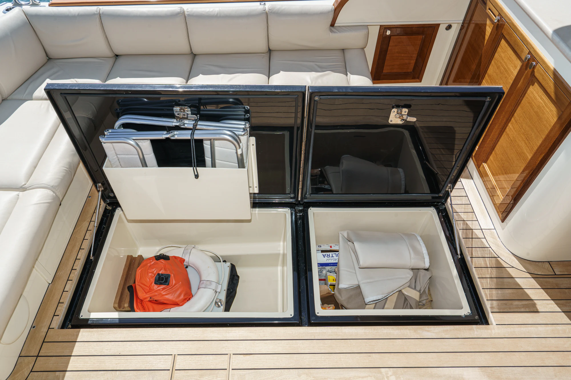 a kitchen with a sink and a toaster oven aboard PIPE DREAM Yacht for Sale