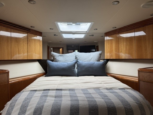 a bed in a room aboard TRUE GRIT Yacht for Sale