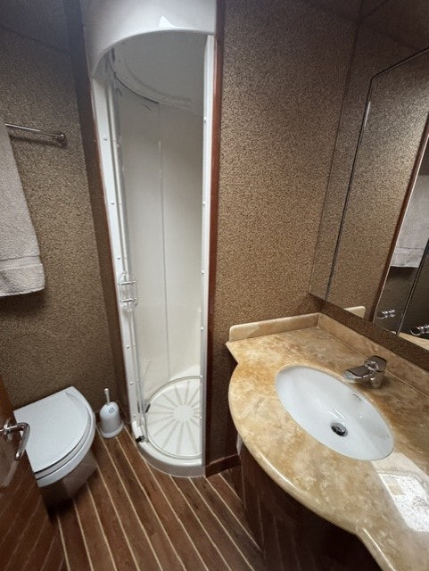 a bathroom with a sink and a shower aboard TRUE GRIT Yacht for Sale