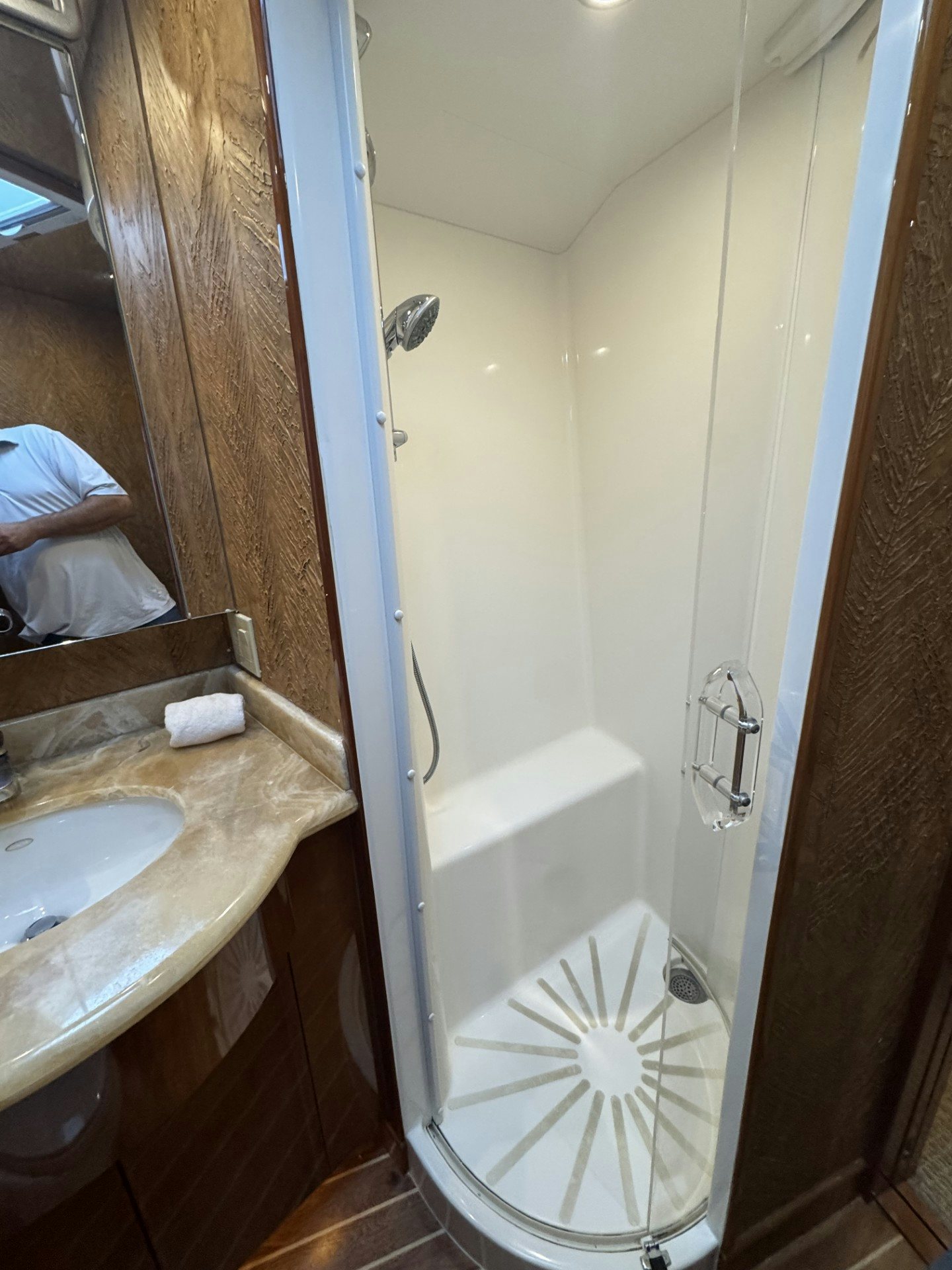 a bathroom with a bathtub and sink aboard TRUE GRIT Yacht for Sale