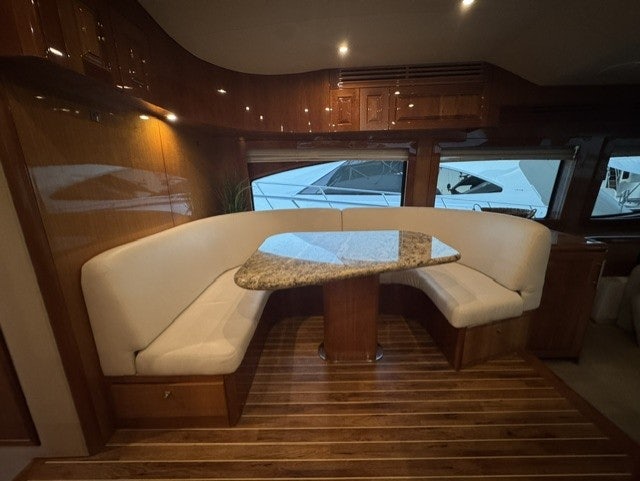 a room with a couch and a table aboard TRUE GRIT Yacht for Sale