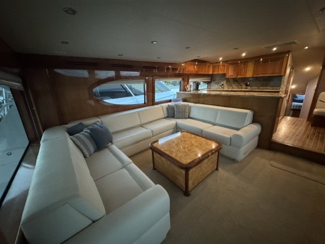 a living room with a couch and a table aboard TRUE GRIT Yacht for Sale