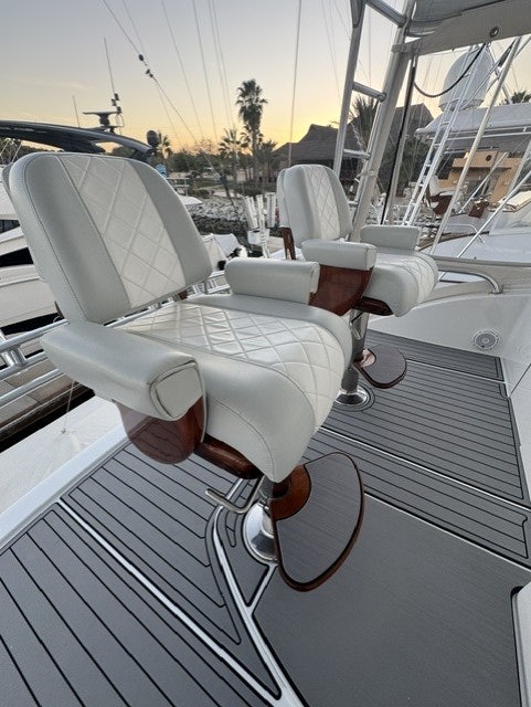 a white car with a steering wheel aboard TRUE GRIT Yacht for Sale
