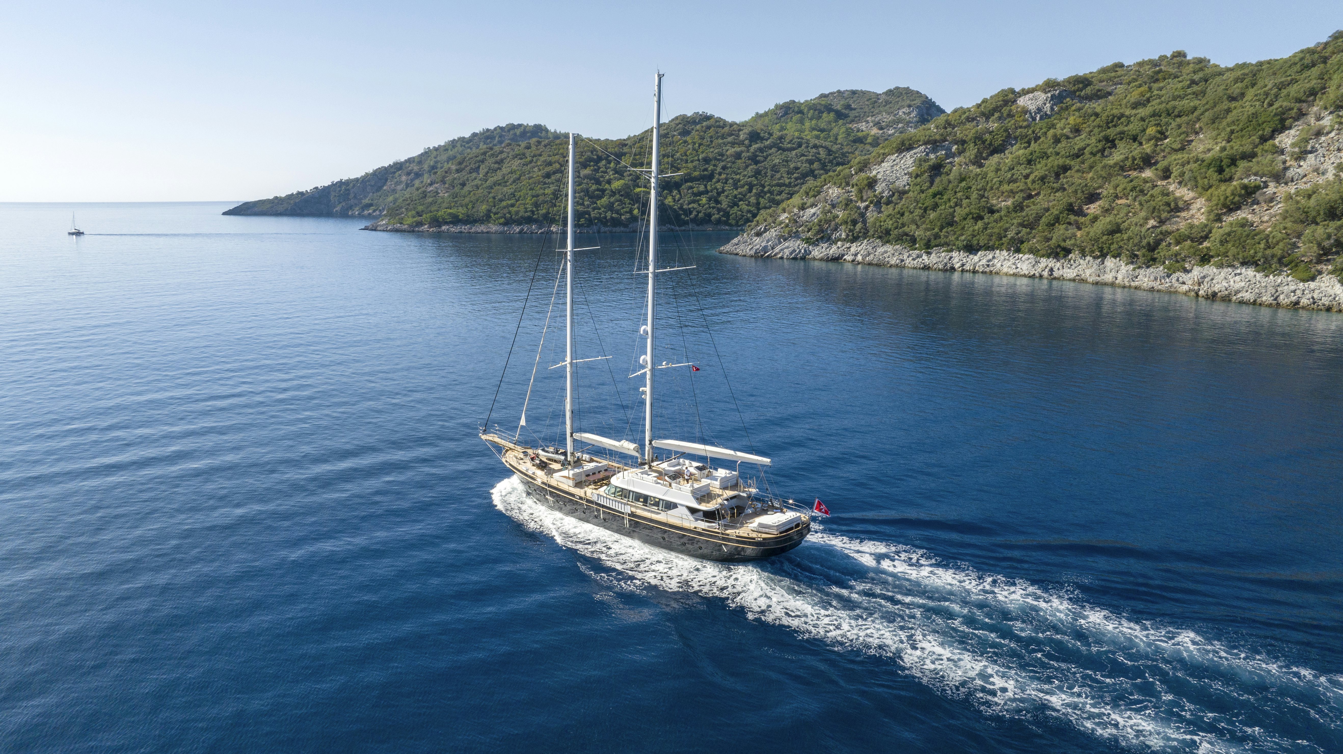 a boat sailing on the water aboard ATLANTIKA Yacht for Sale