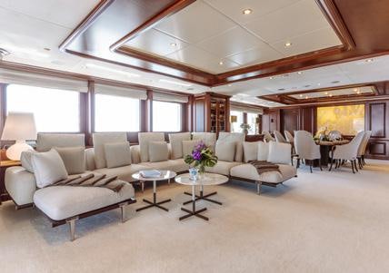 a living room with a large open floor plan aboard HEMABEJO Yacht for Charter