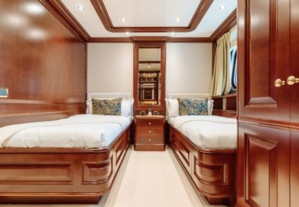 a room with two beds aboard HEMABEJO Yacht for Charter