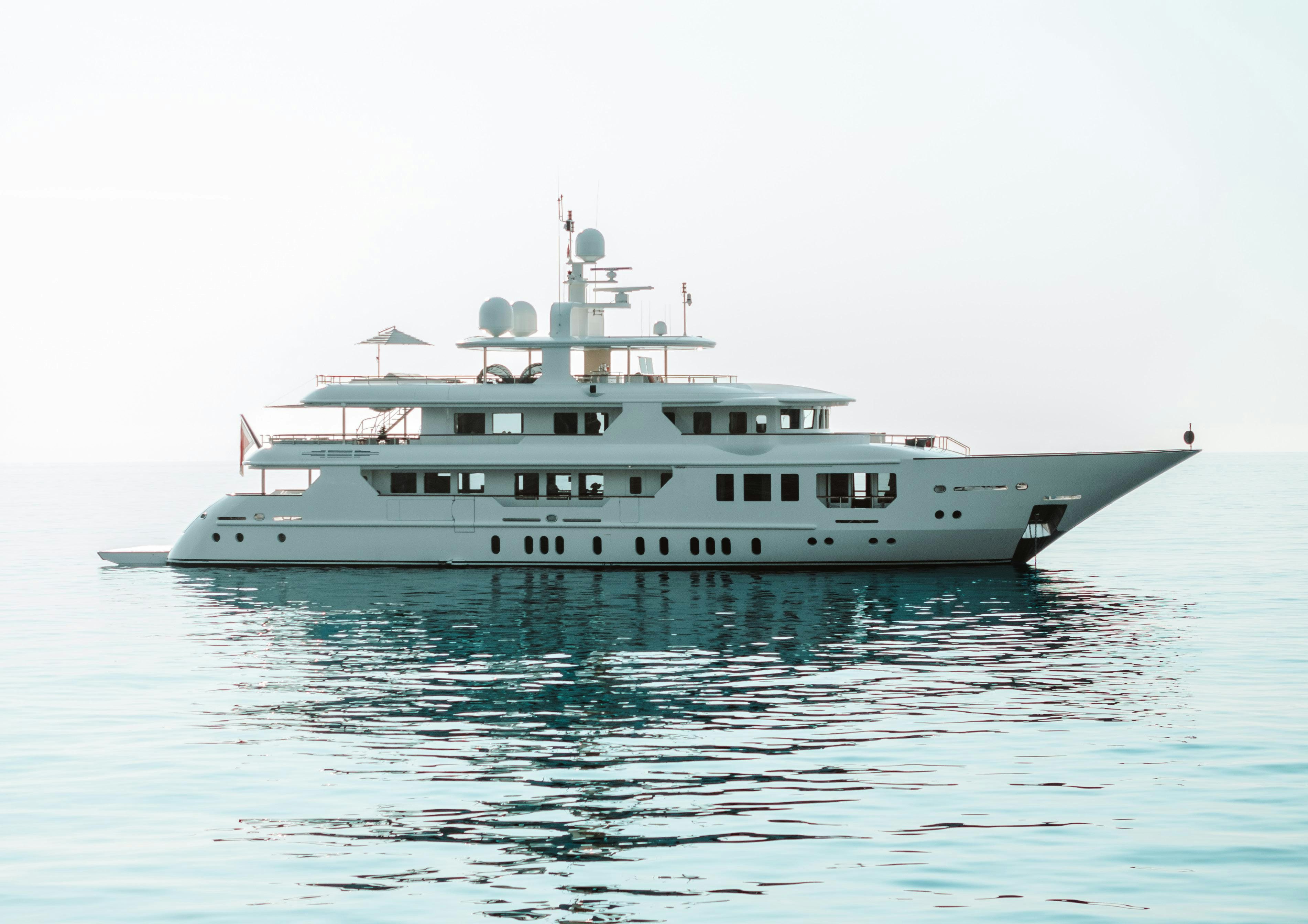 a large white boat aboard INCAL Yacht for Charter