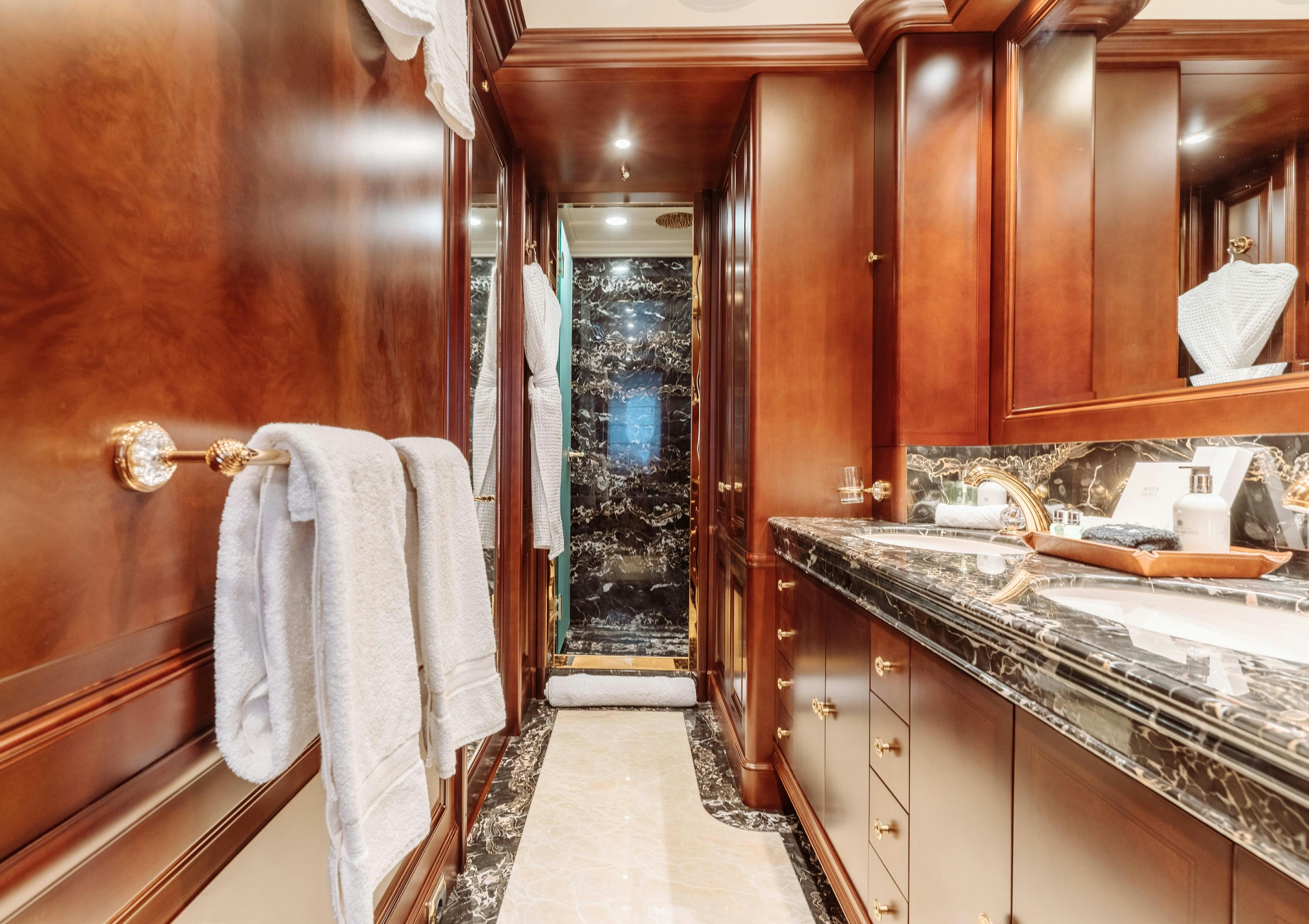 a bathroom with a large countertop aboard HEMABEJO Yacht for Charter