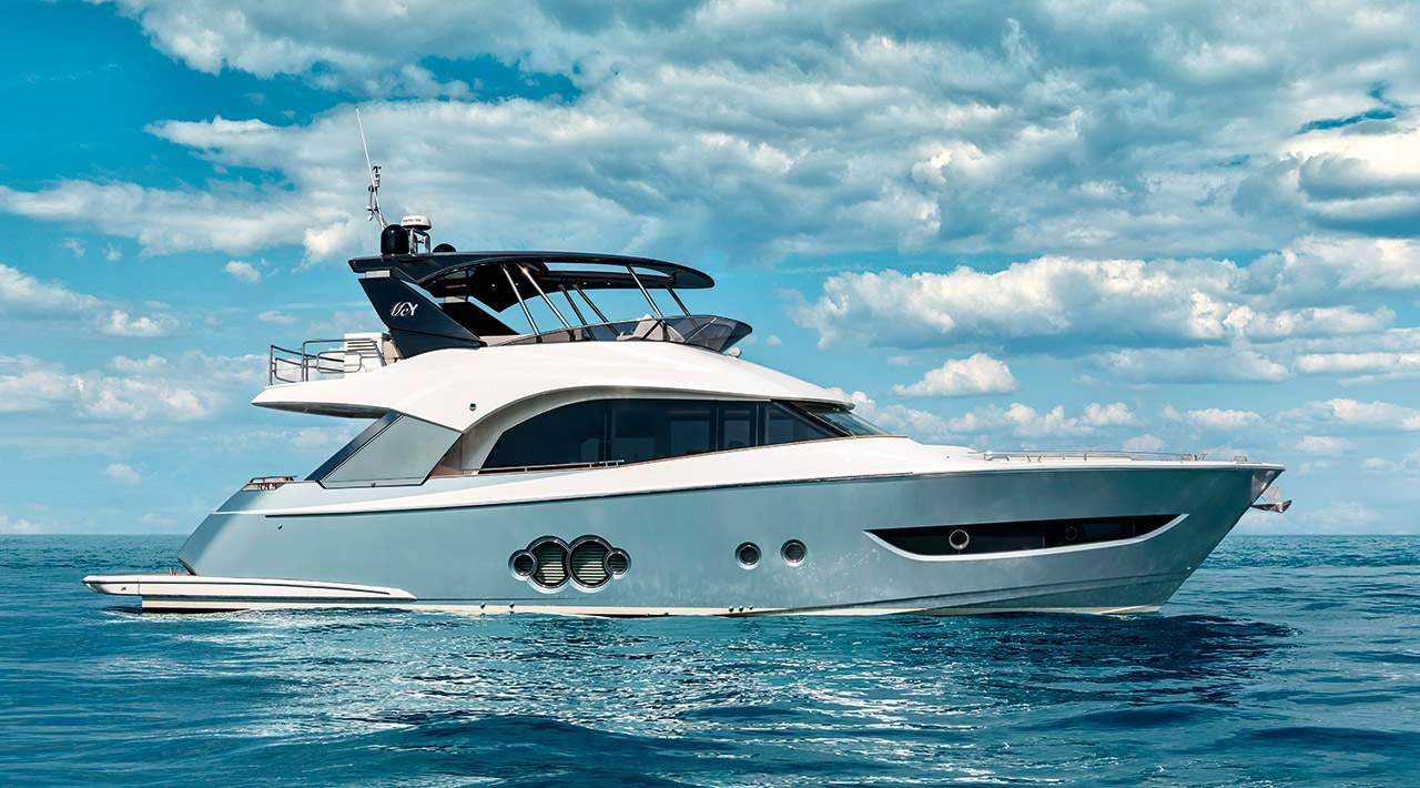 a white yacht in the water aboard GRACE Yacht for Sale