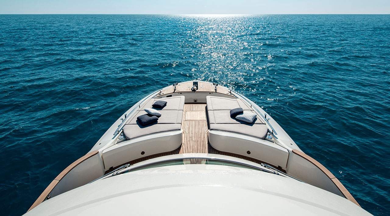 a white boat in the water aboard GRACE Yacht for Sale