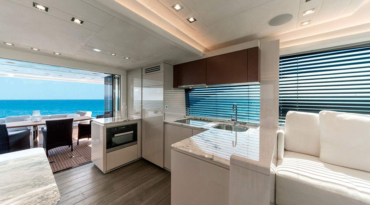 a living room with a view of the ocean aboard GRACE Yacht for Sale