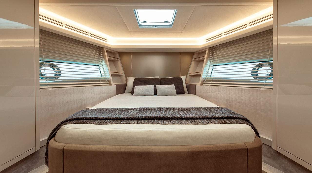 a bed in a room aboard GRACE Yacht for Sale