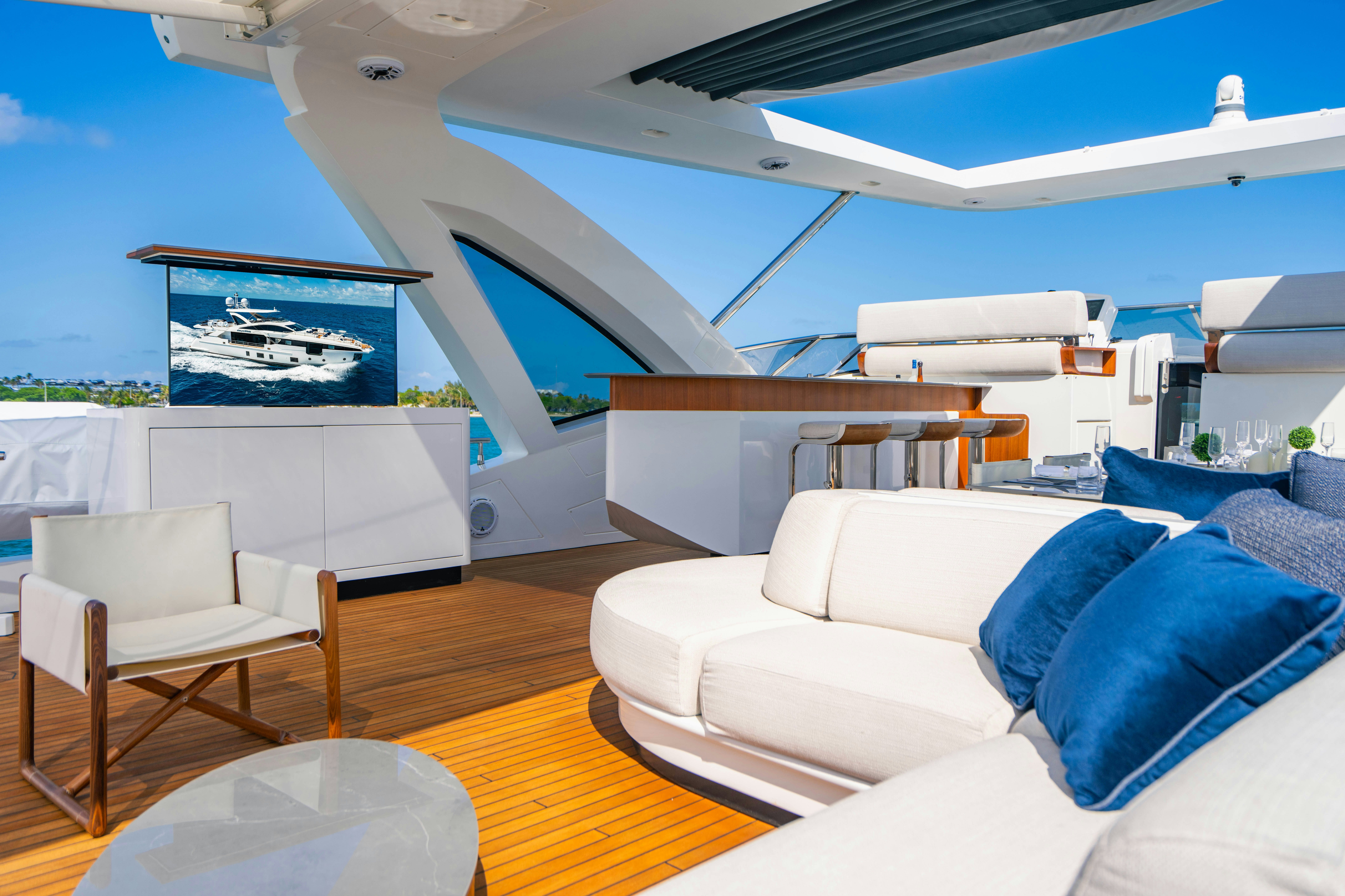 a living room with a large window aboard CARPE DIEM Yacht for Charter
