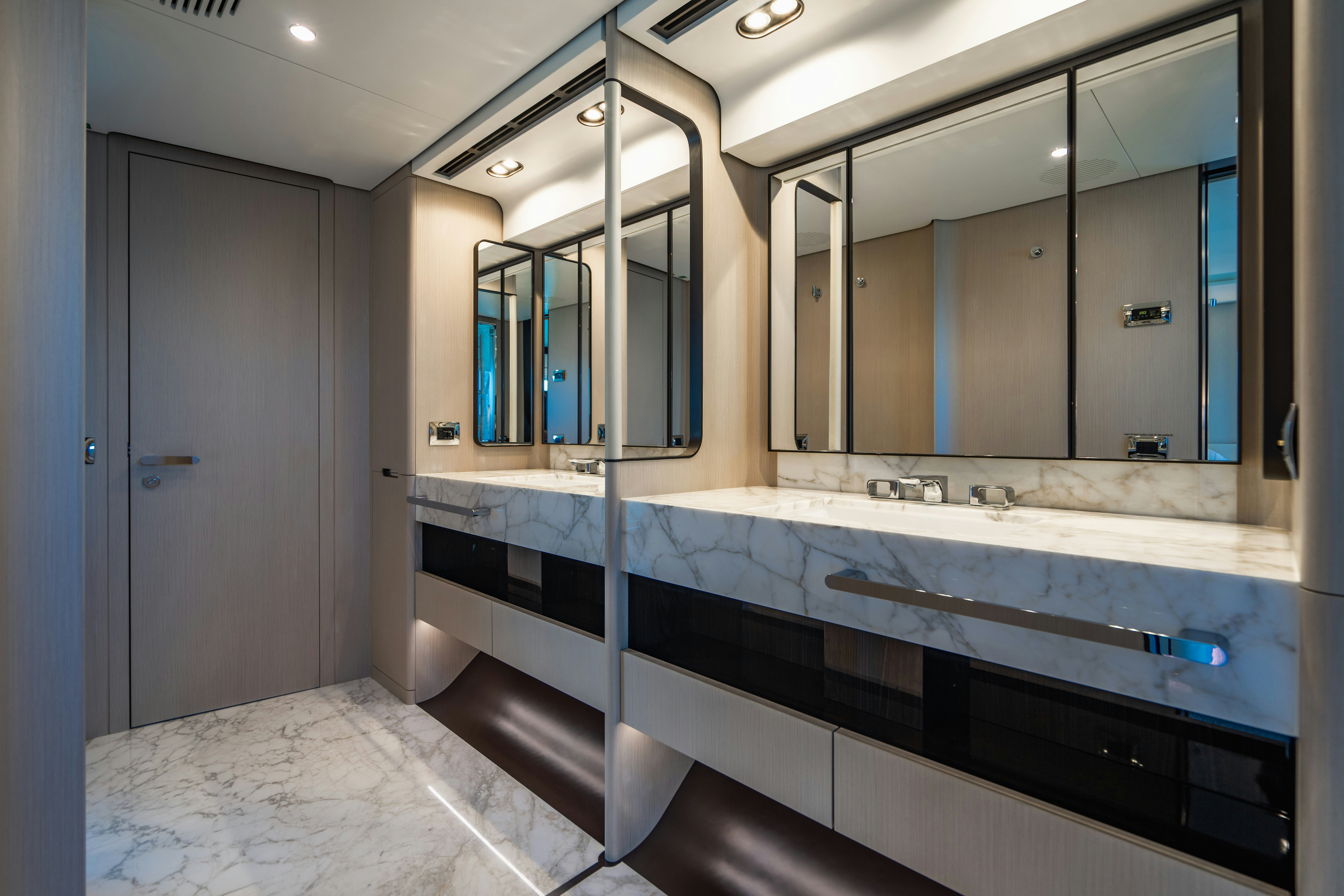 a bathroom with a large mirror aboard CARPE DIEM Yacht for Charter