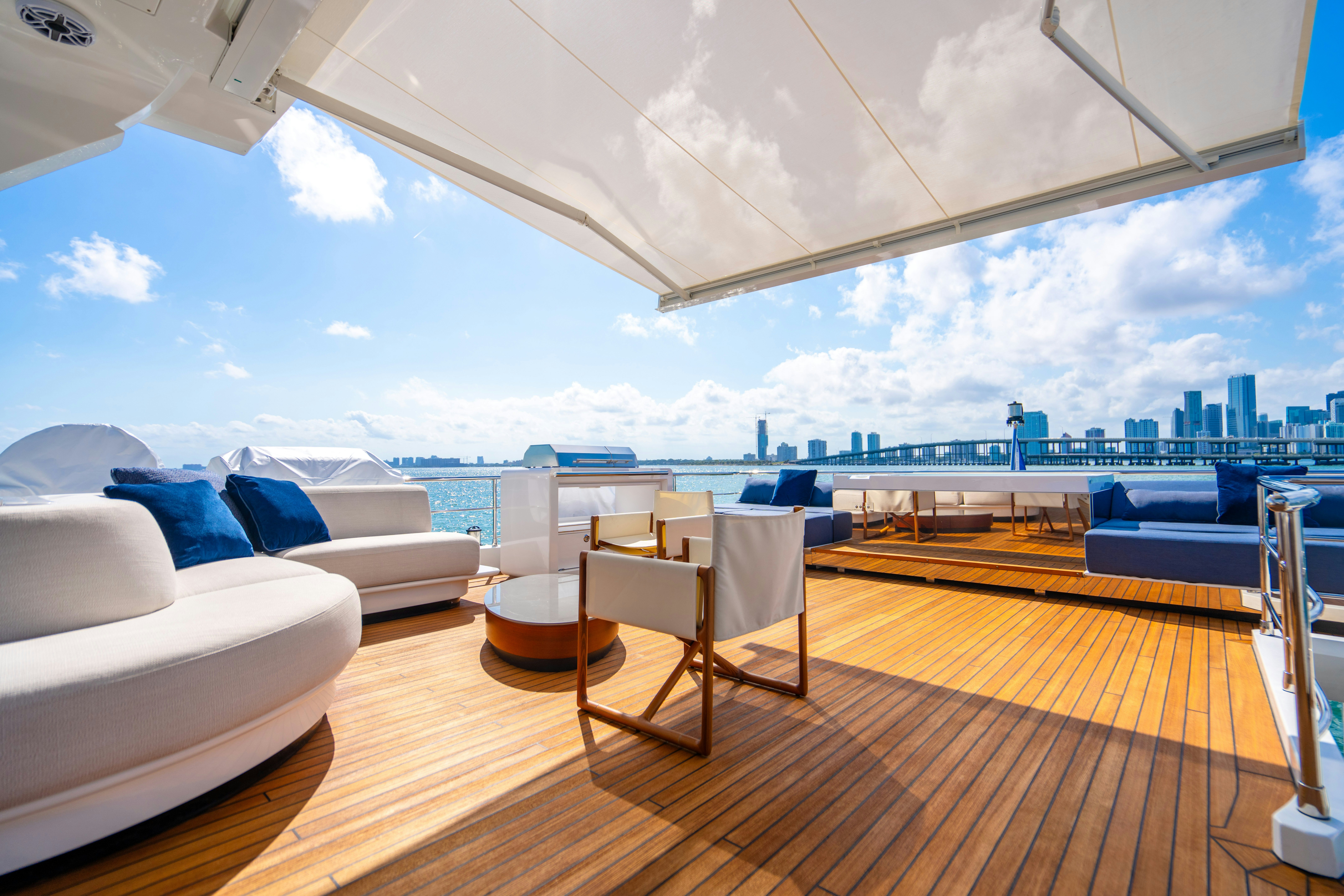 a room with a view of a city and a body of water aboard CARPE DIEM Yacht for Charter