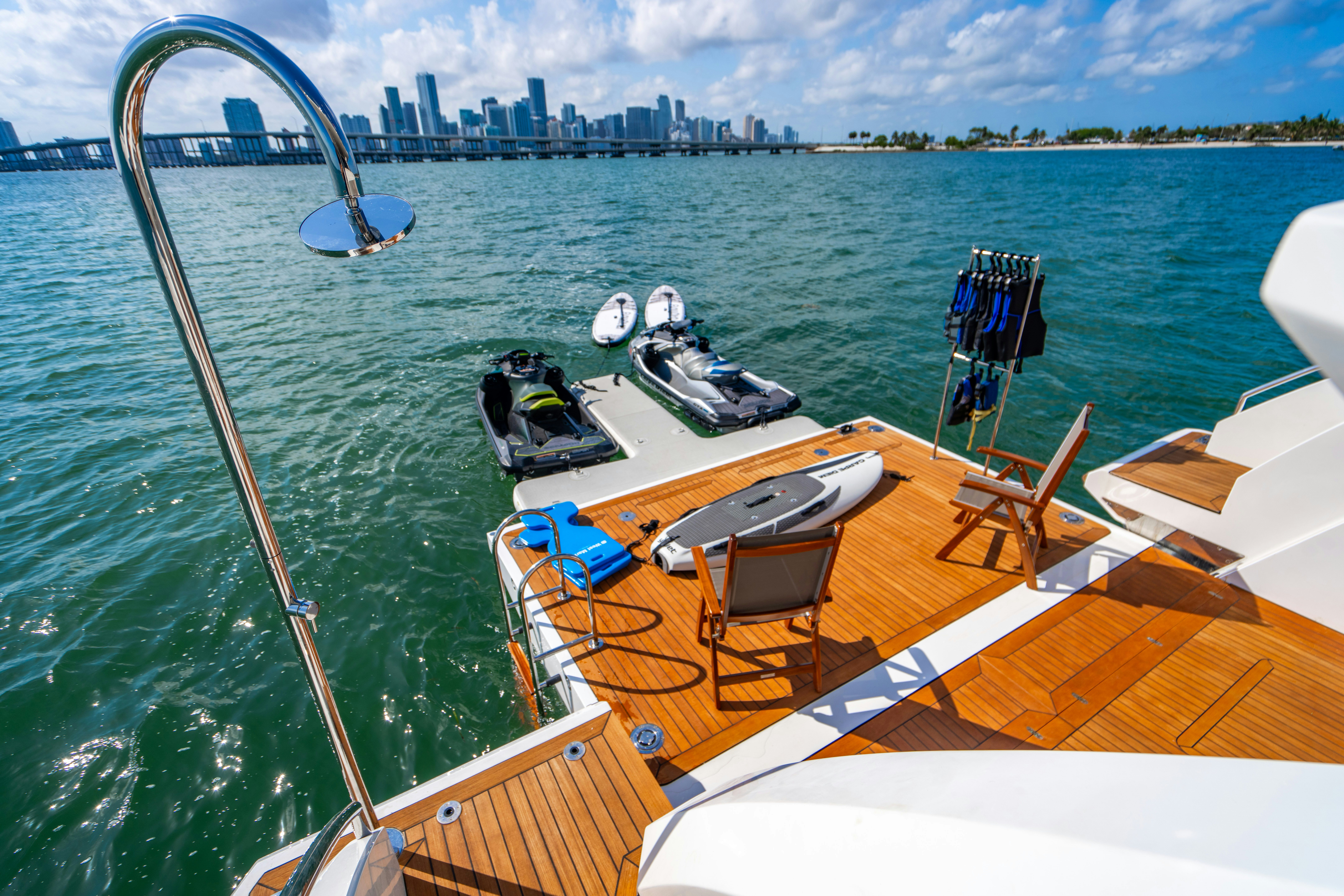 a boat with a paddle on the water aboard CARPE DIEM Yacht for Charter