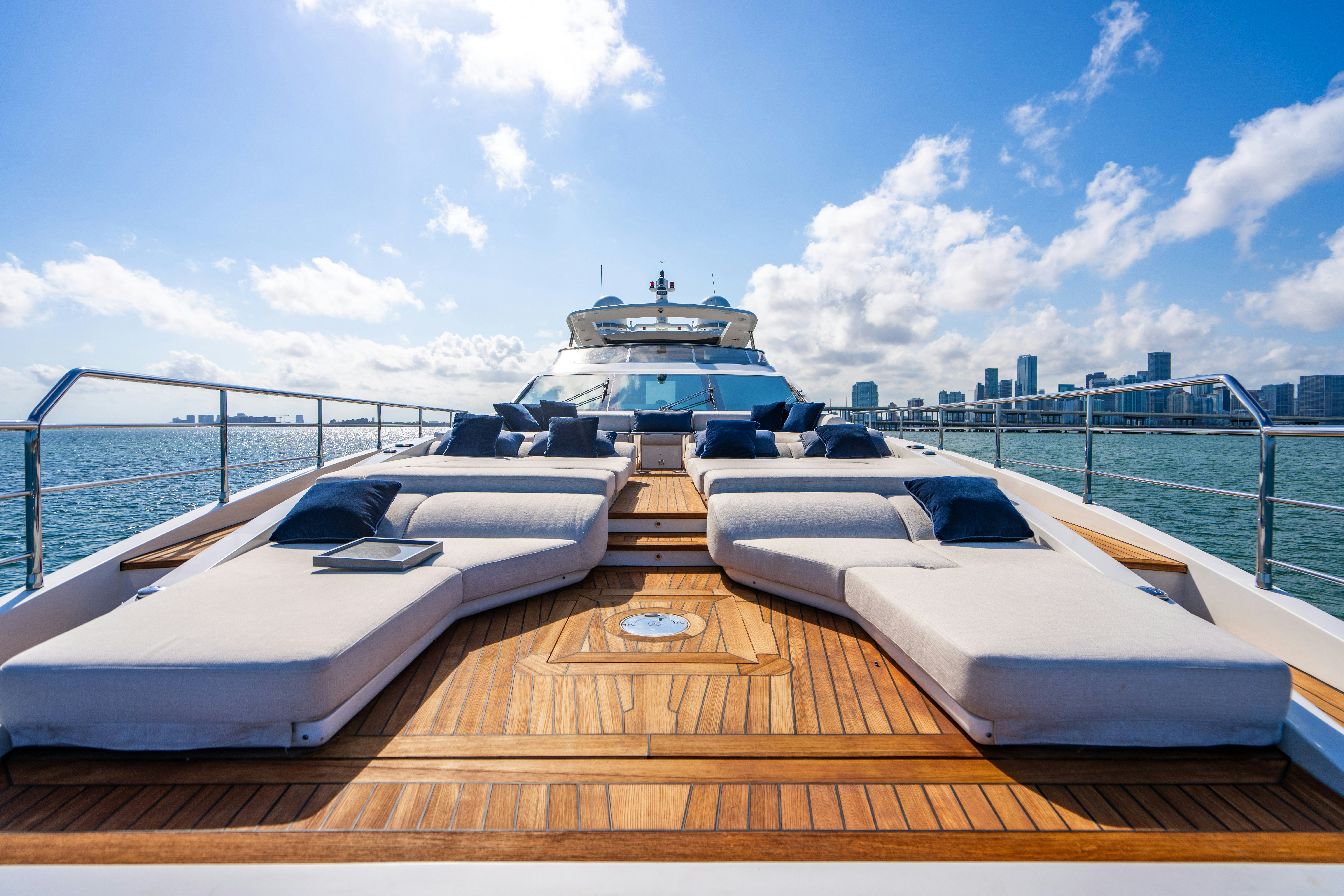 a deck with a couple of boats on it aboard CARPE DIEM Yacht for Charter