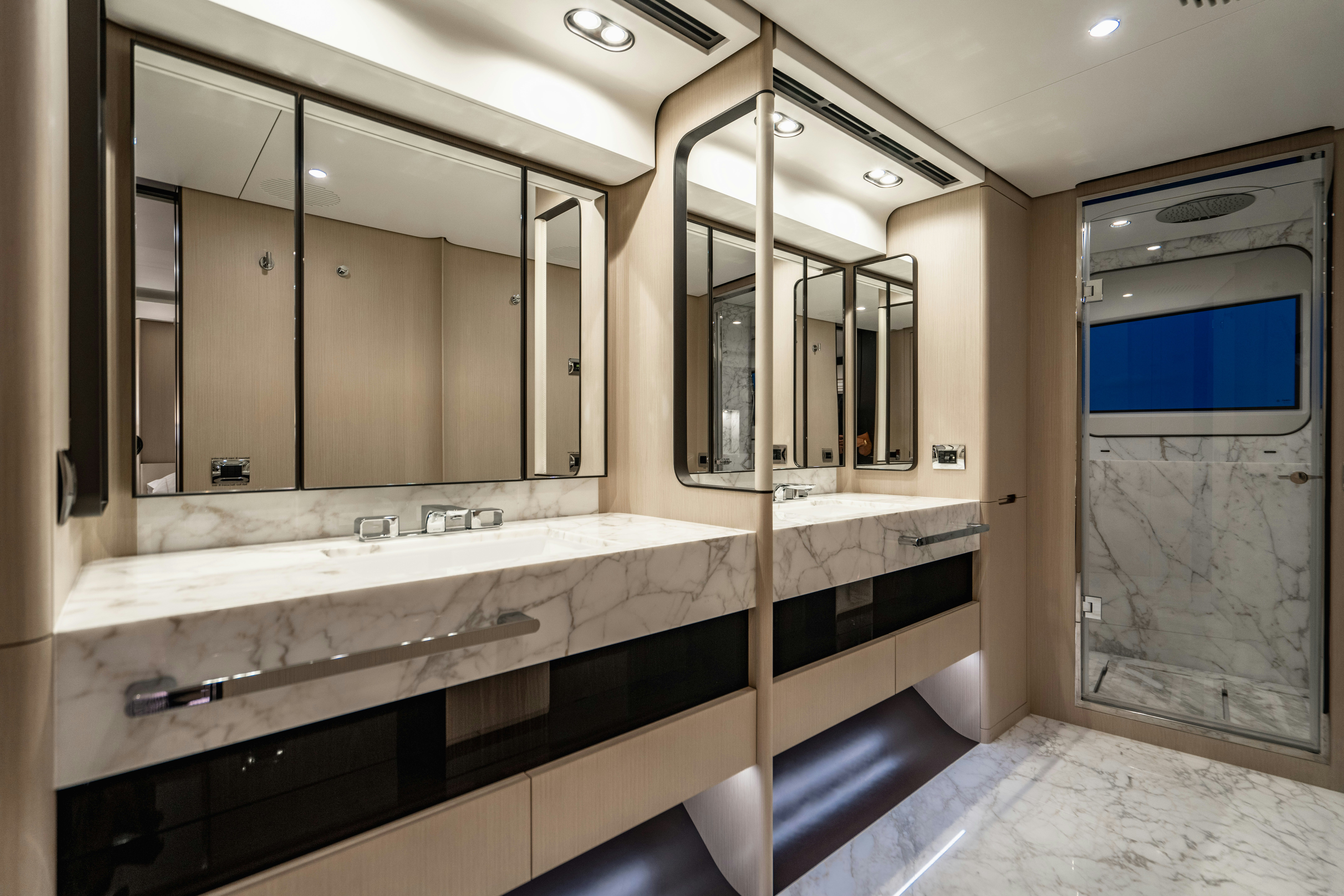 a bathroom with a large mirror aboard CARPE DIEM Yacht for Charter