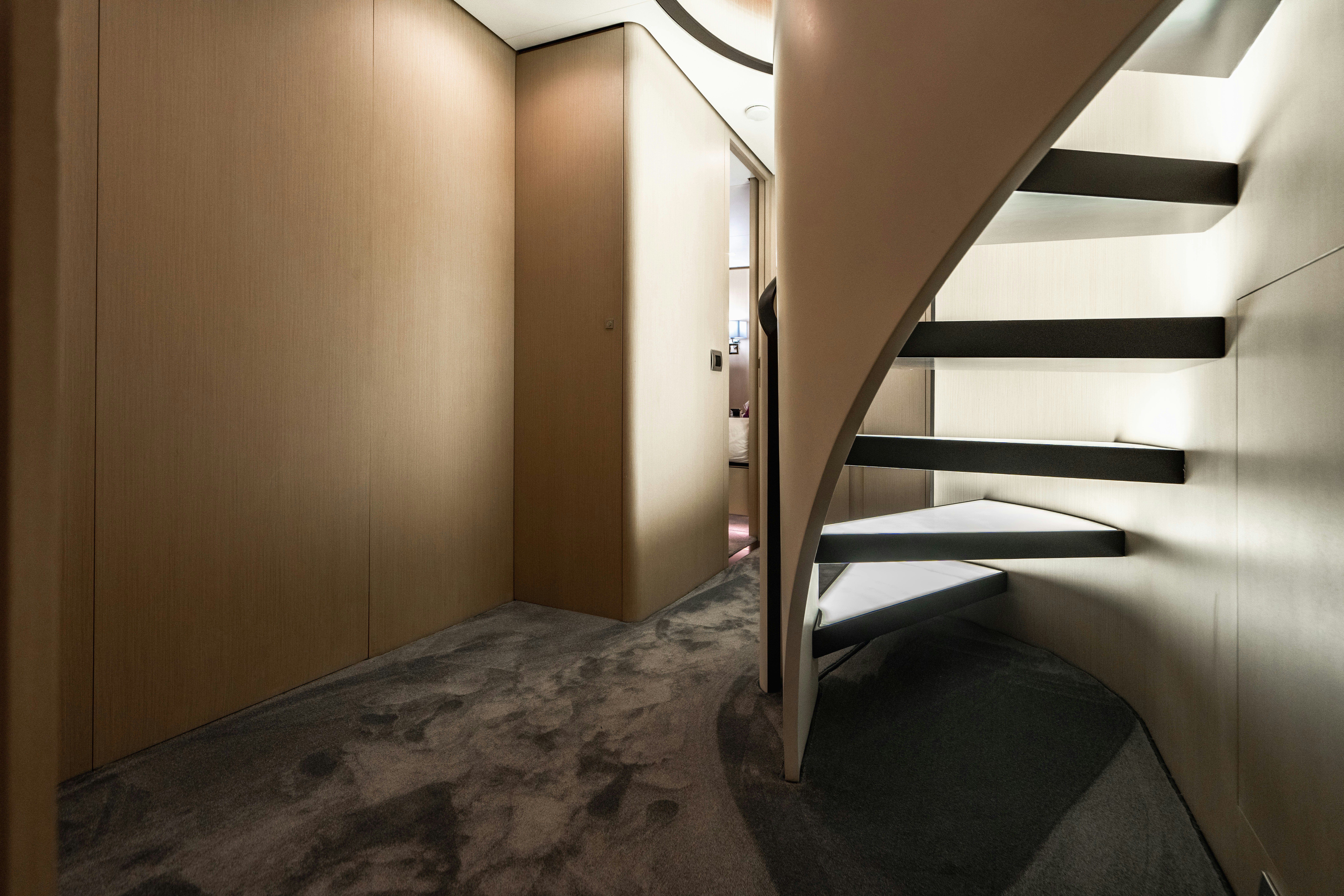 a staircase in a building aboard CARPE DIEM Yacht for Charter
