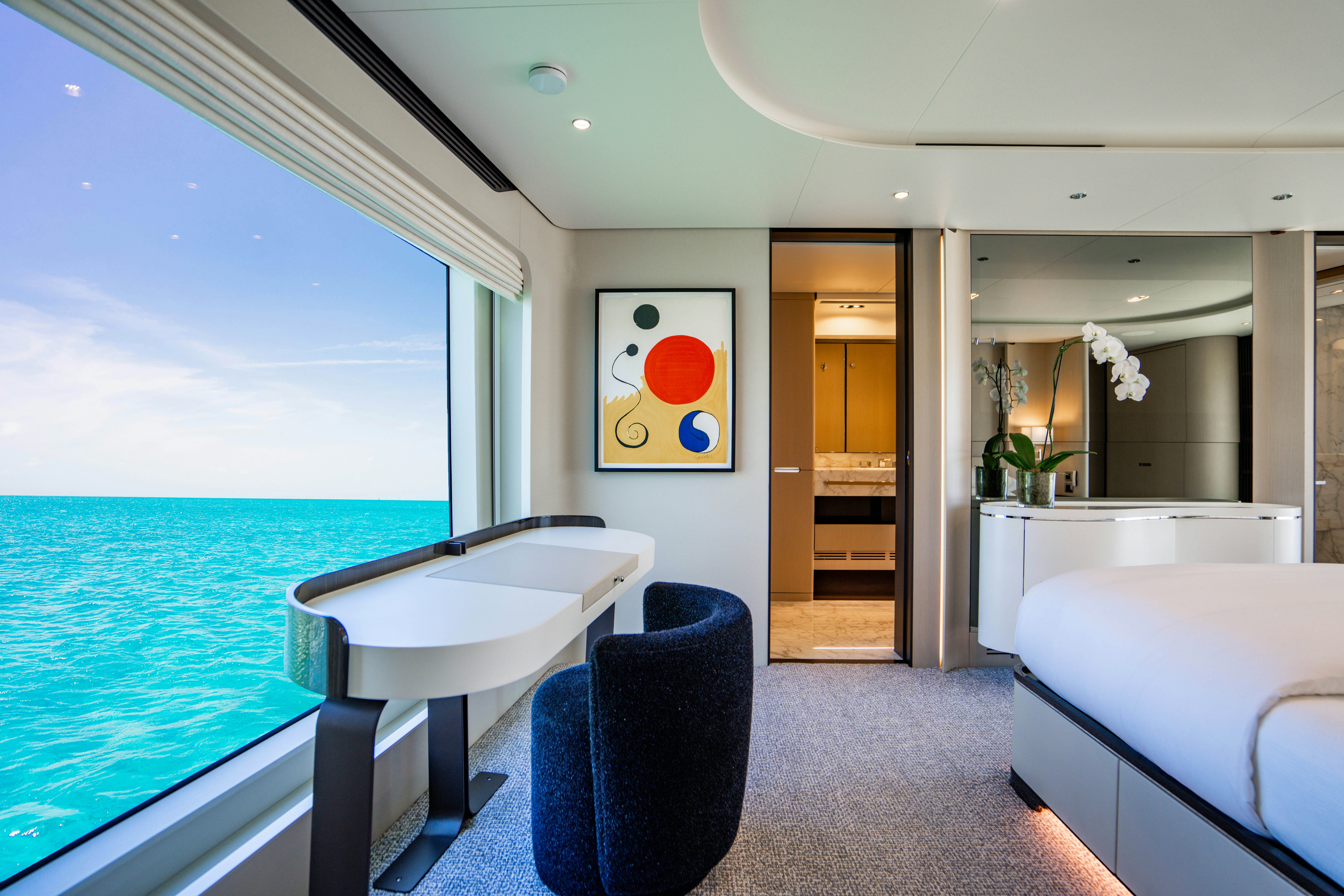 a room with a table and chairs aboard CARPE DIEM Yacht for Charter