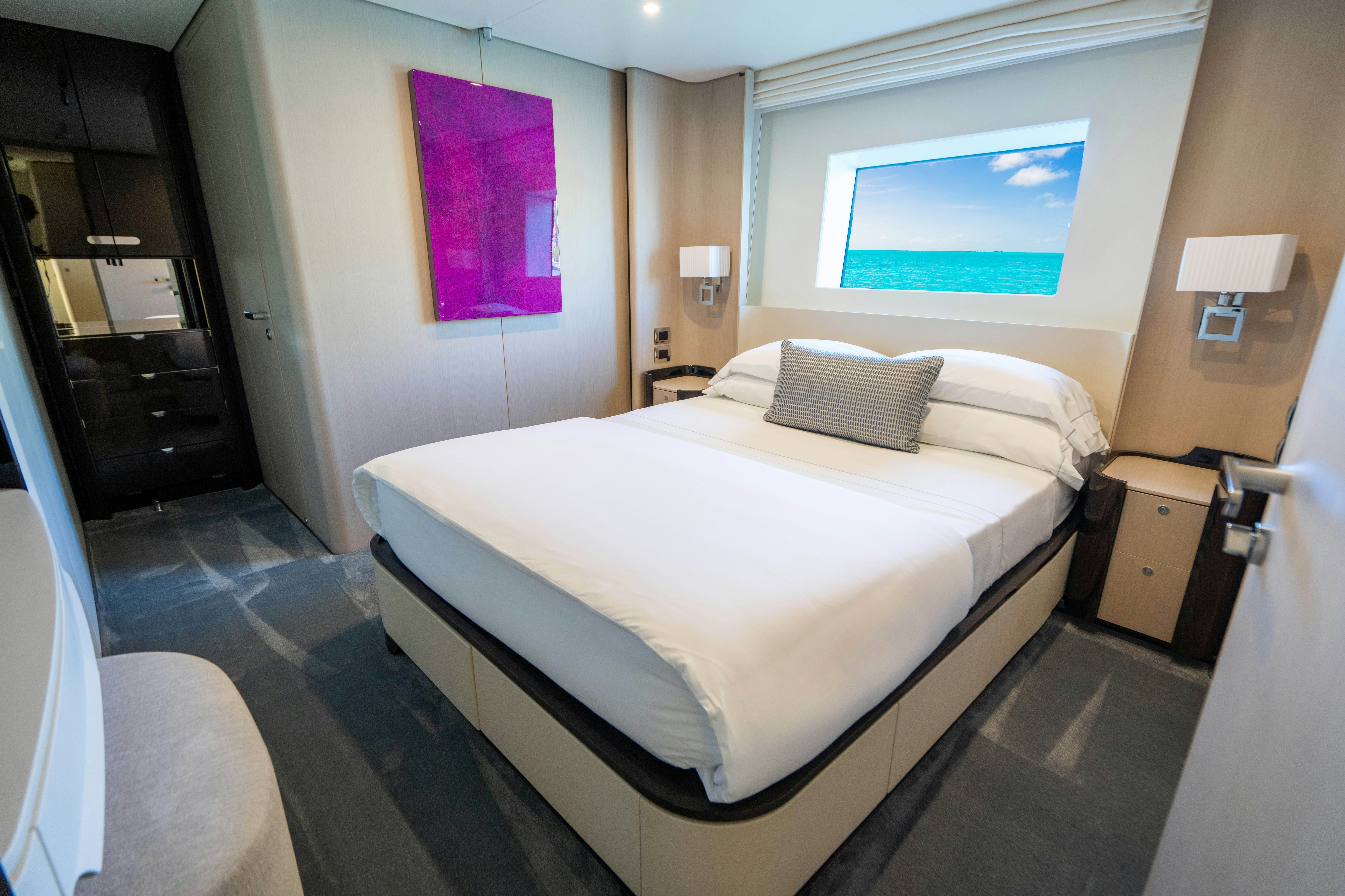 a hotel room with a bed aboard CARPE DIEM Yacht for Charter